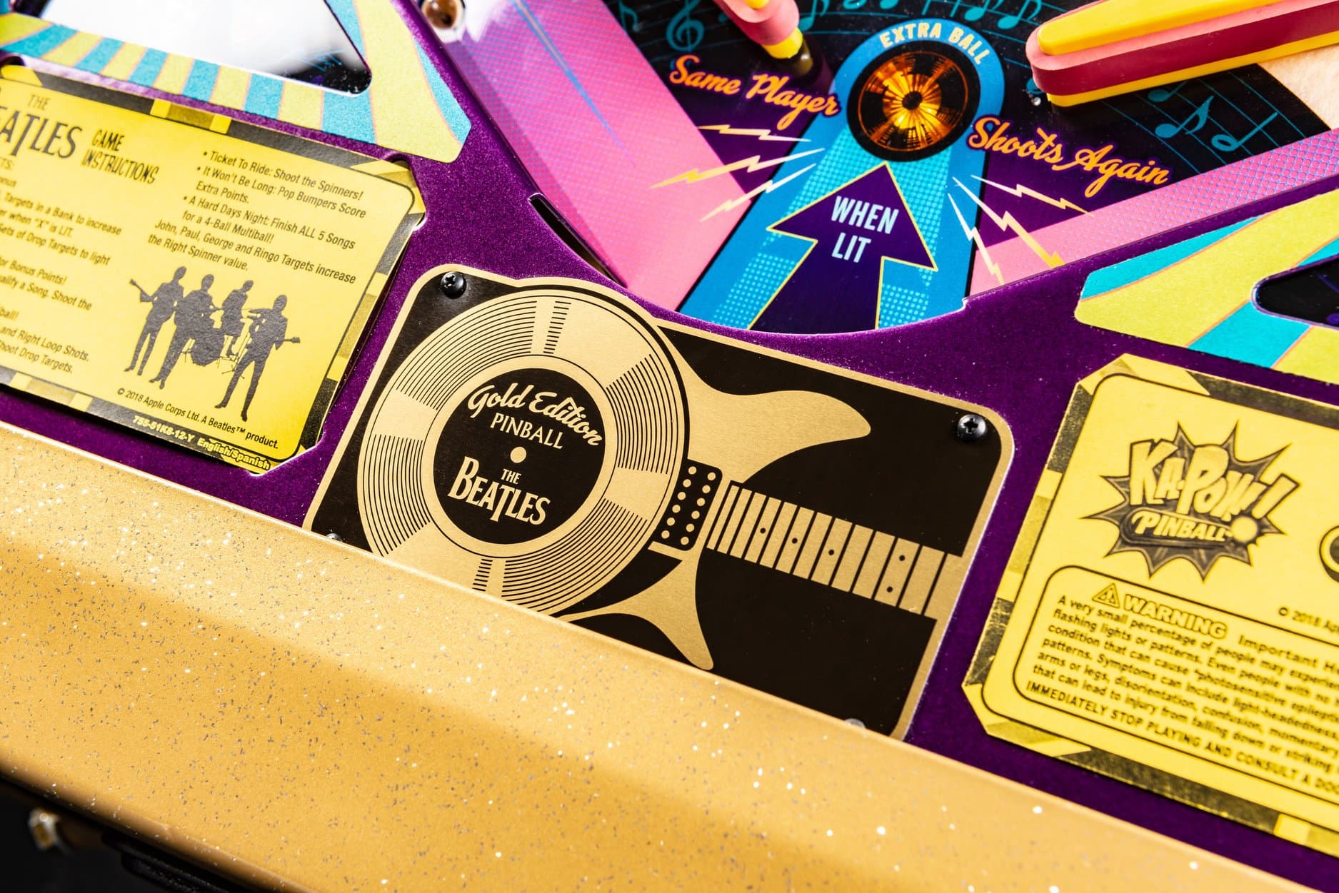 The Beatles Gold Edition pinball machine with colorful, detailed play surface