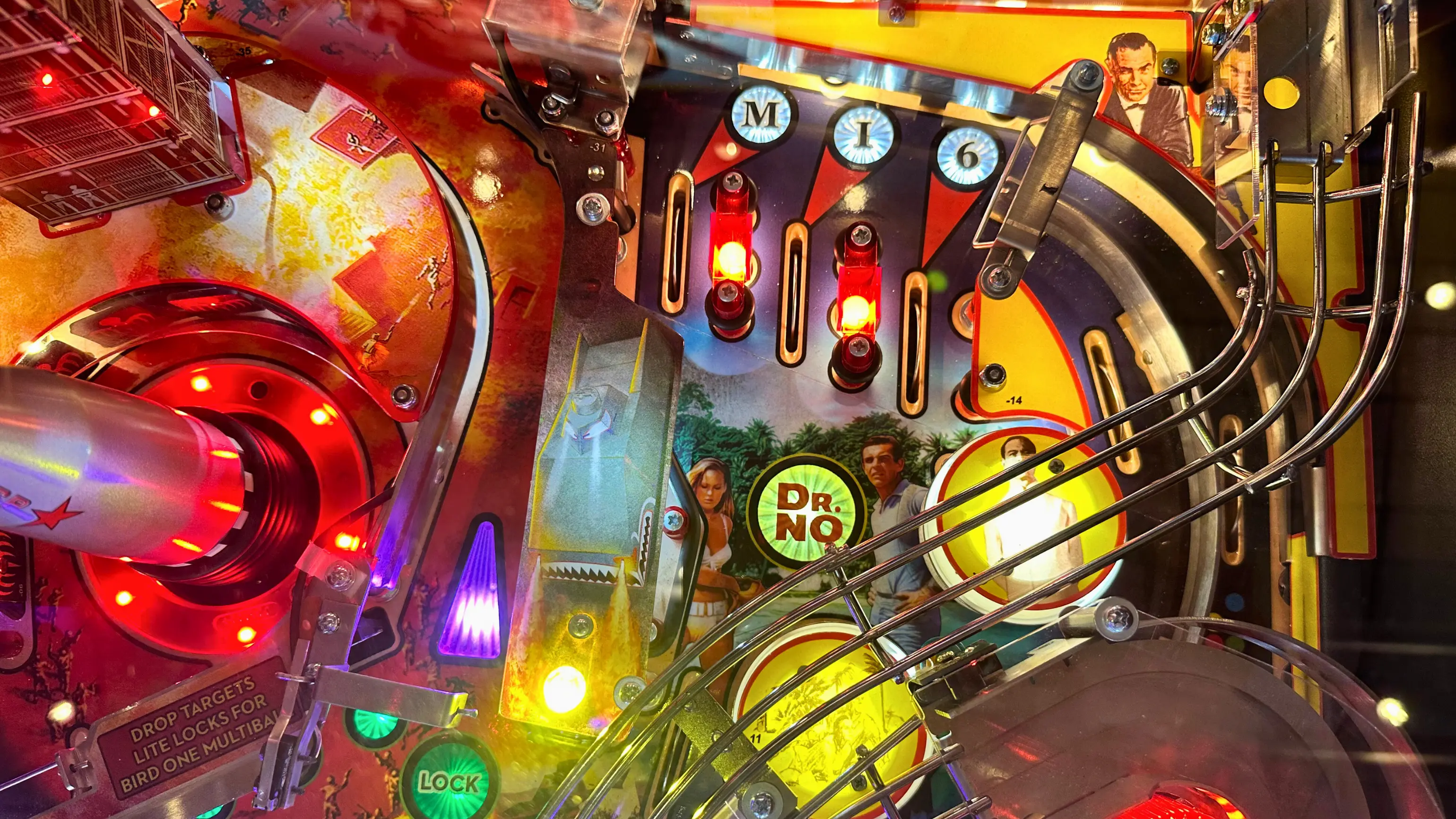 Colorful Dr. No pinball machine with vibrant lights and intricate mechanical details