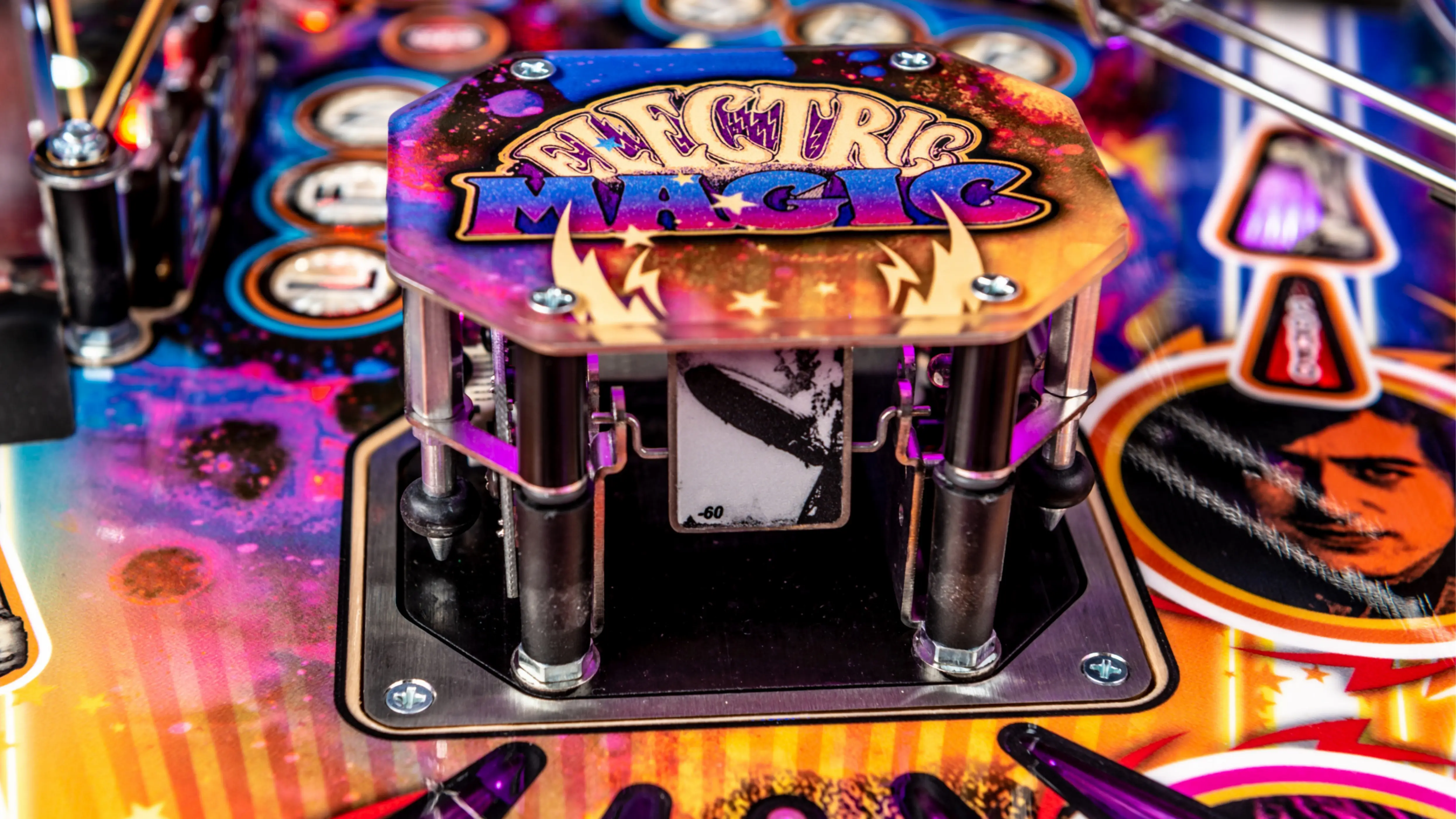 Colorful Electric Magic pinball machine detail with vibrant graphics