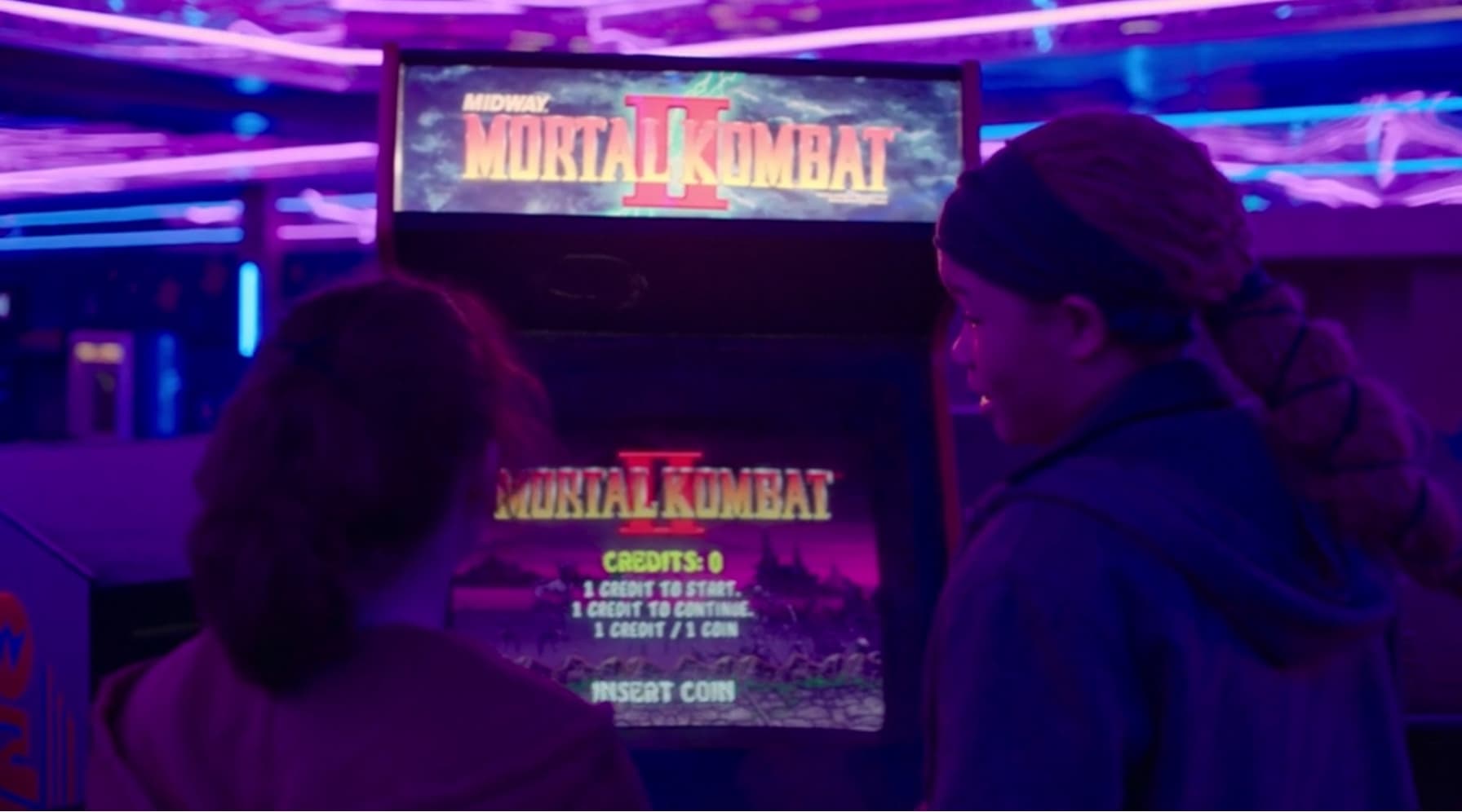 Mortal Kombat II arcade game screen with purple neon lighting