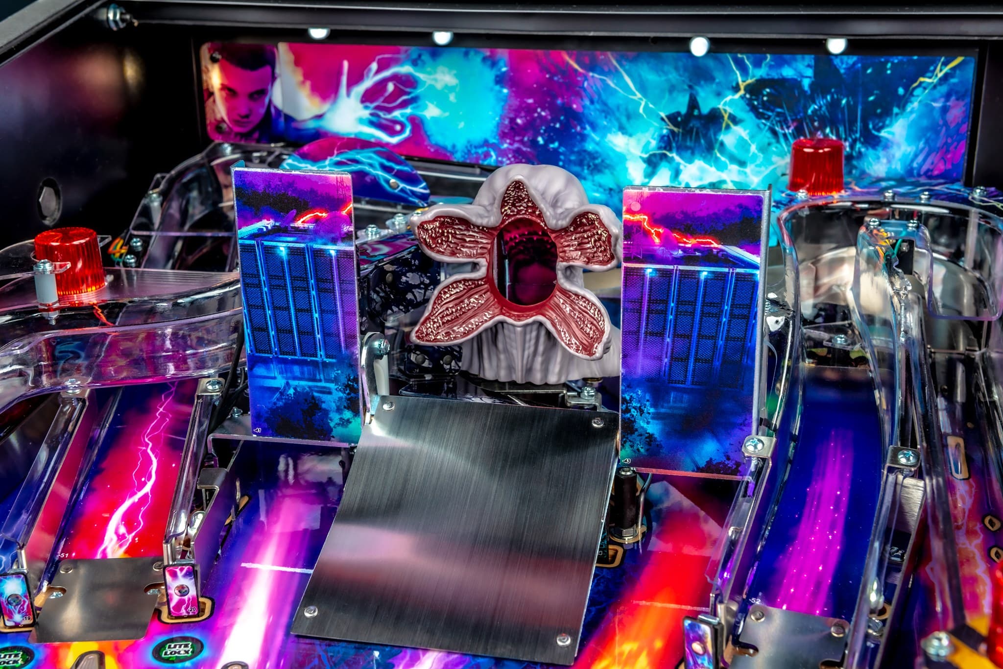 Stranger Things pinball machine with Demogorgon and colorful neon background