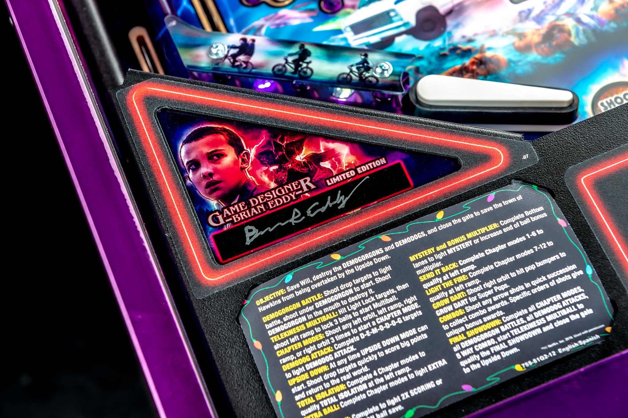 Stranger Things game designer card with neon red border and character image