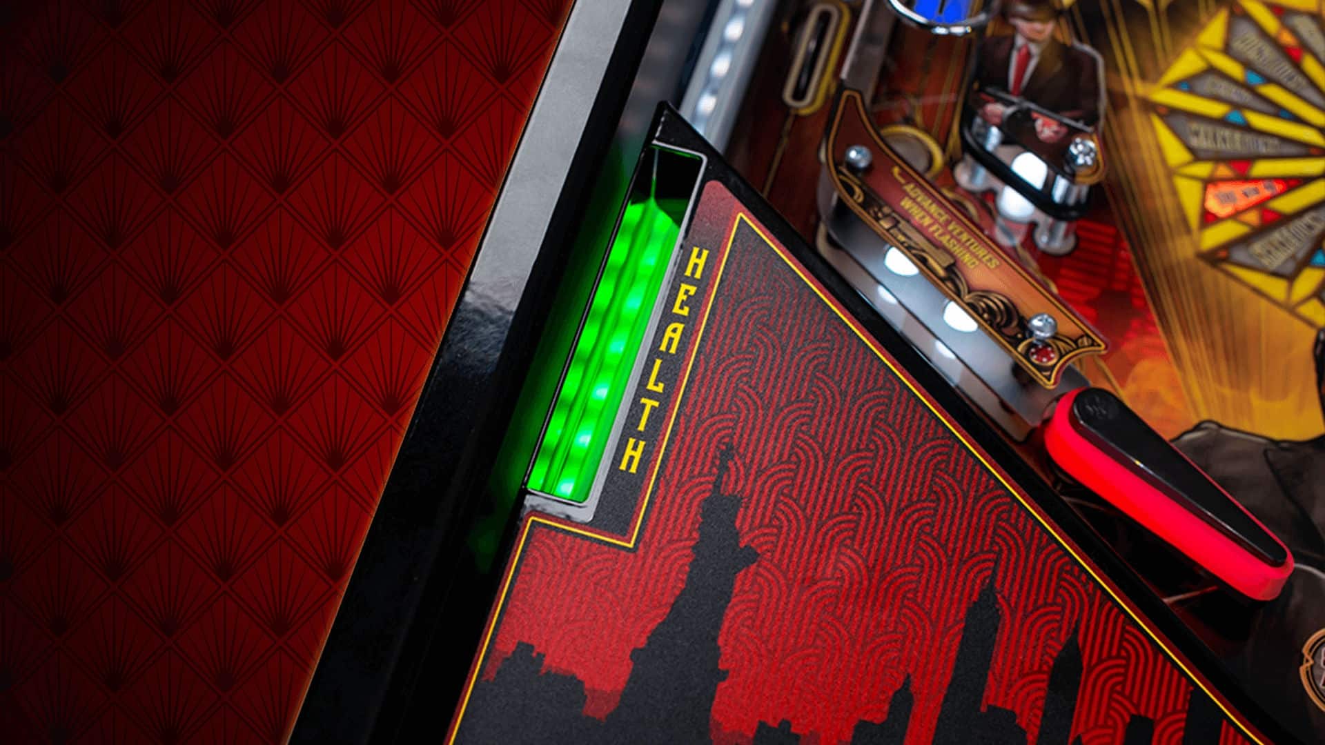 Pinball machine health meter with green glowing display and city silhouette