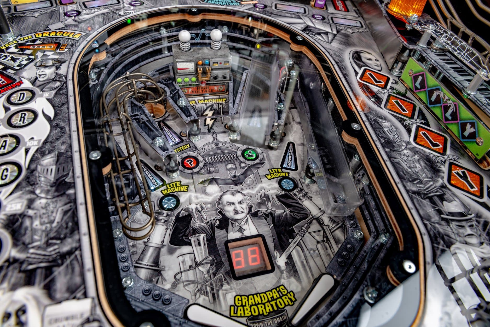 Detailed vintage pinball machine playfield with Grandpa's Laboratory theme