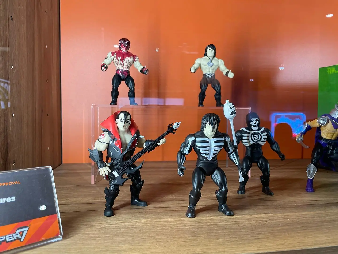 Collectible action figures of muscular characters with gothic and horror styles