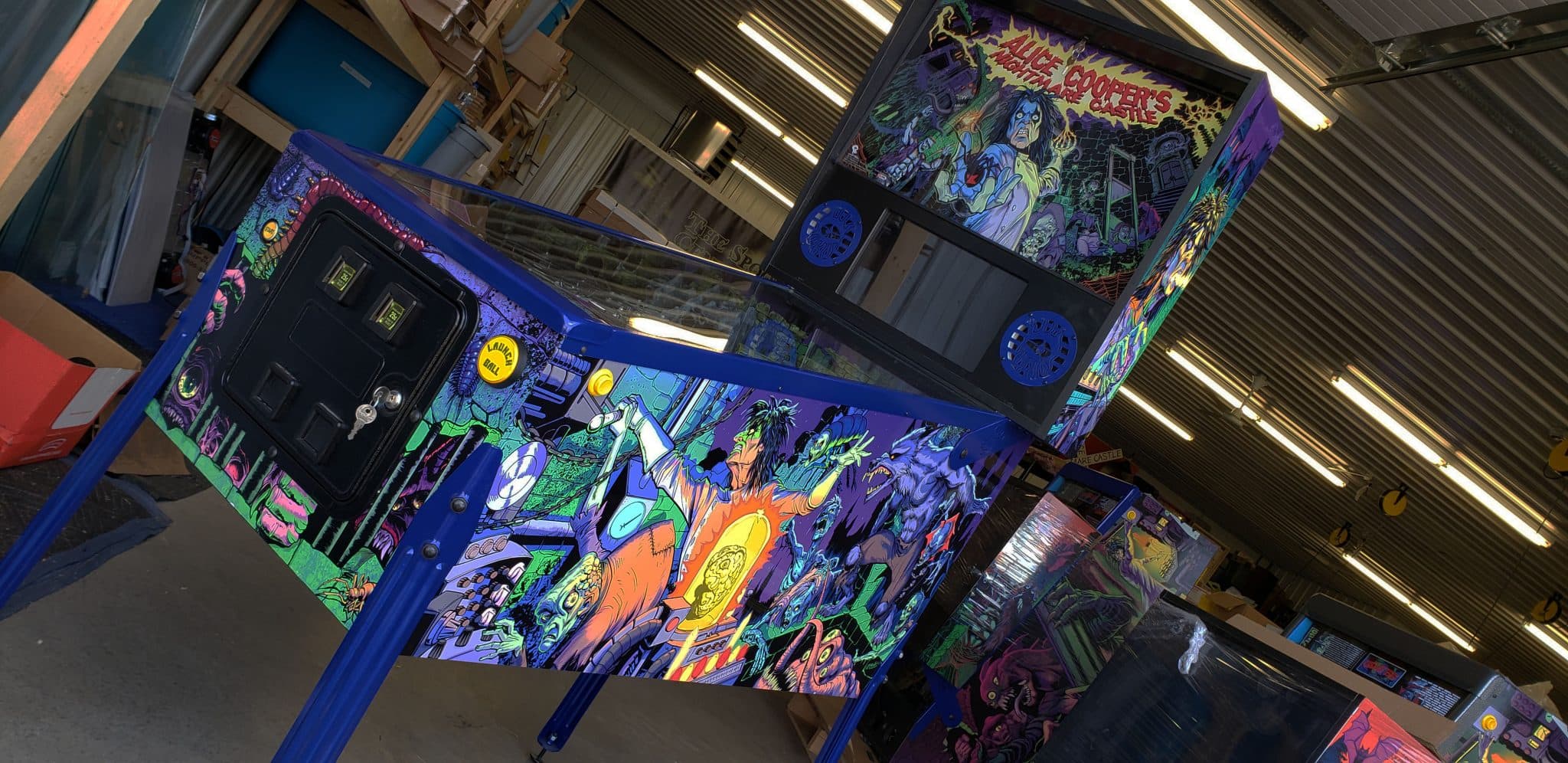 Colorful Alice Cooper pinball machine with vibrant comic-style artwork