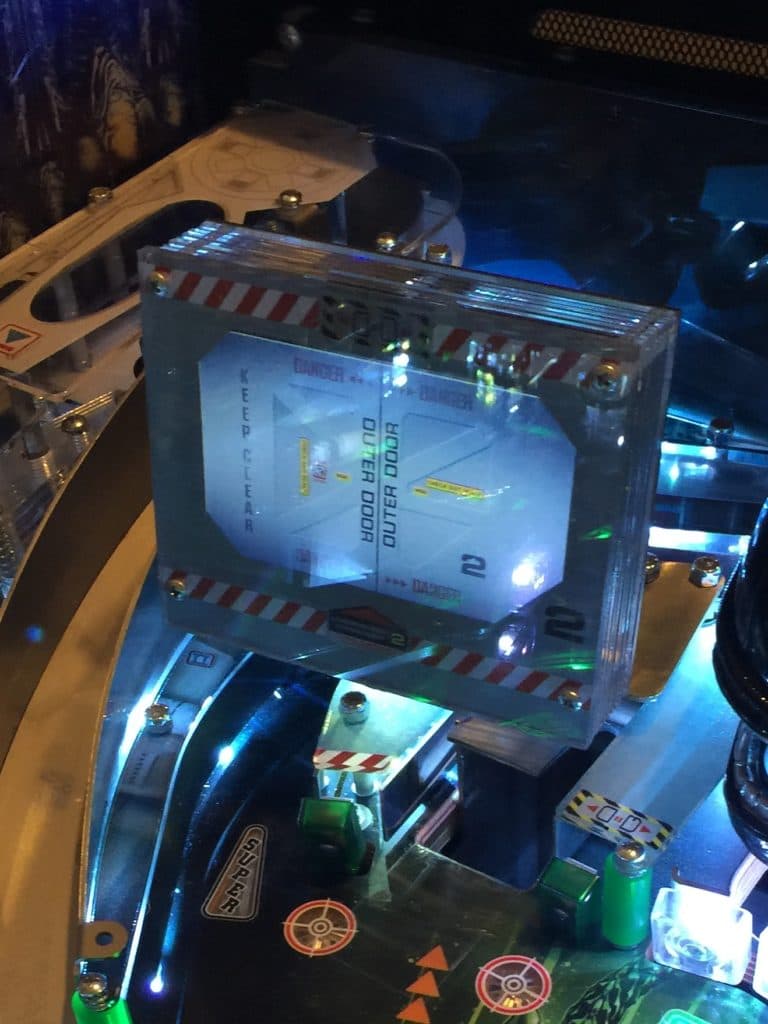 Illuminated electronic circuit board with transparent casing and blue lights