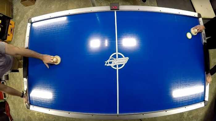 What makes an arcade style air hockey table?