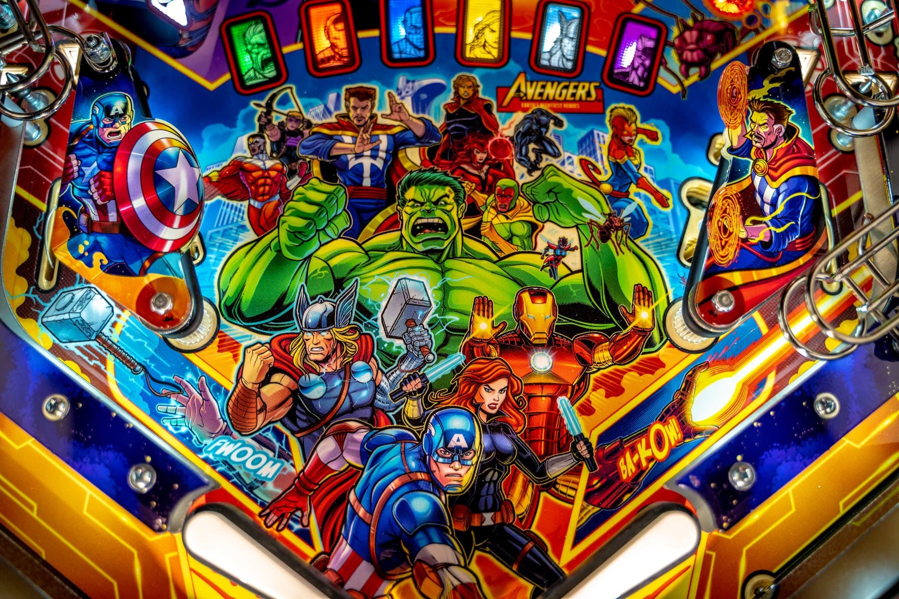 Colorful Marvel Avengers pinball machine with superheroes in dynamic poses