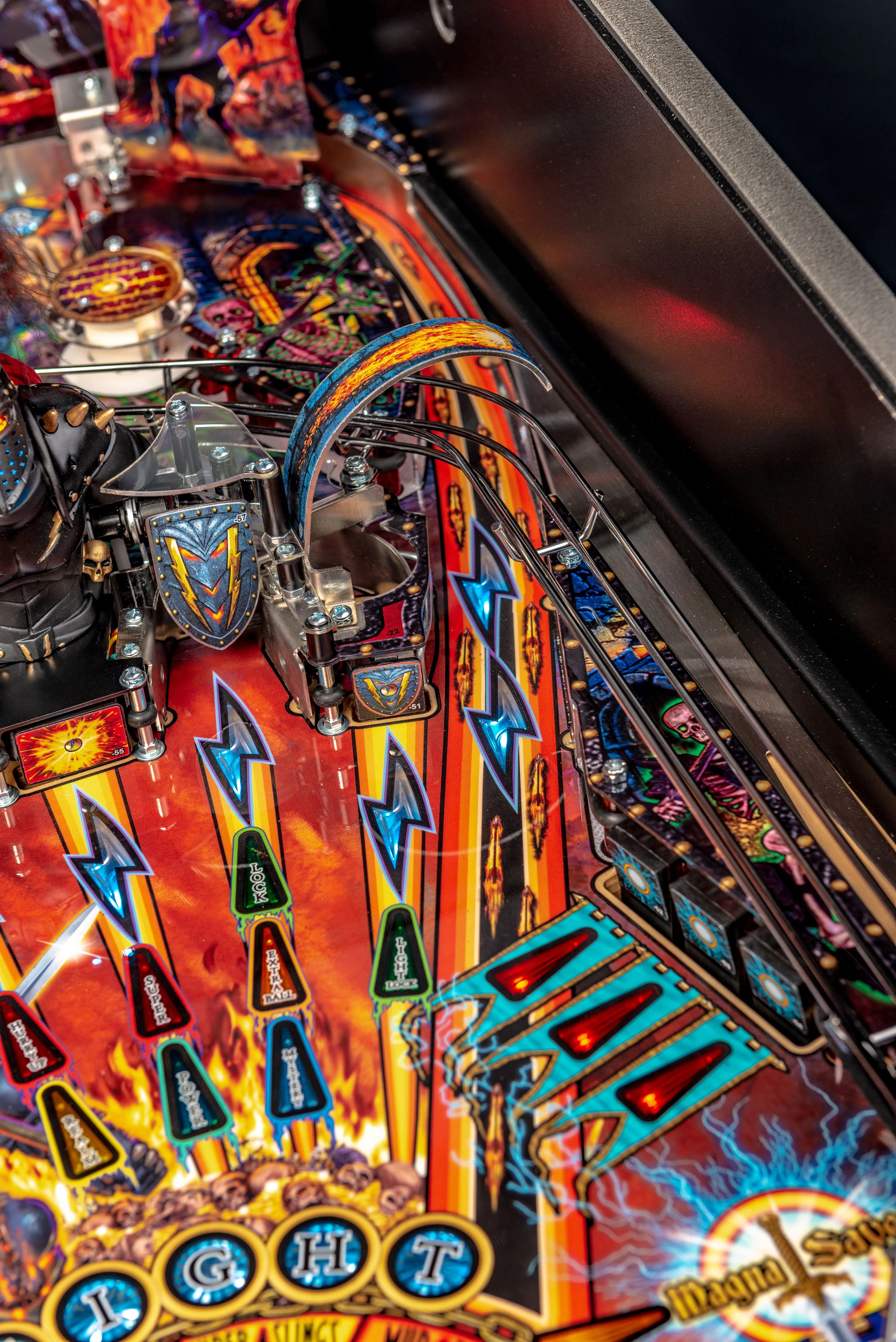 Colorful pinball machine with vibrant lightning bolts and flames