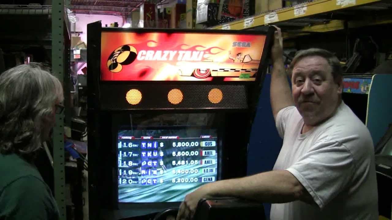 Sega Crazy Taxi arcade machine with high score screen and players