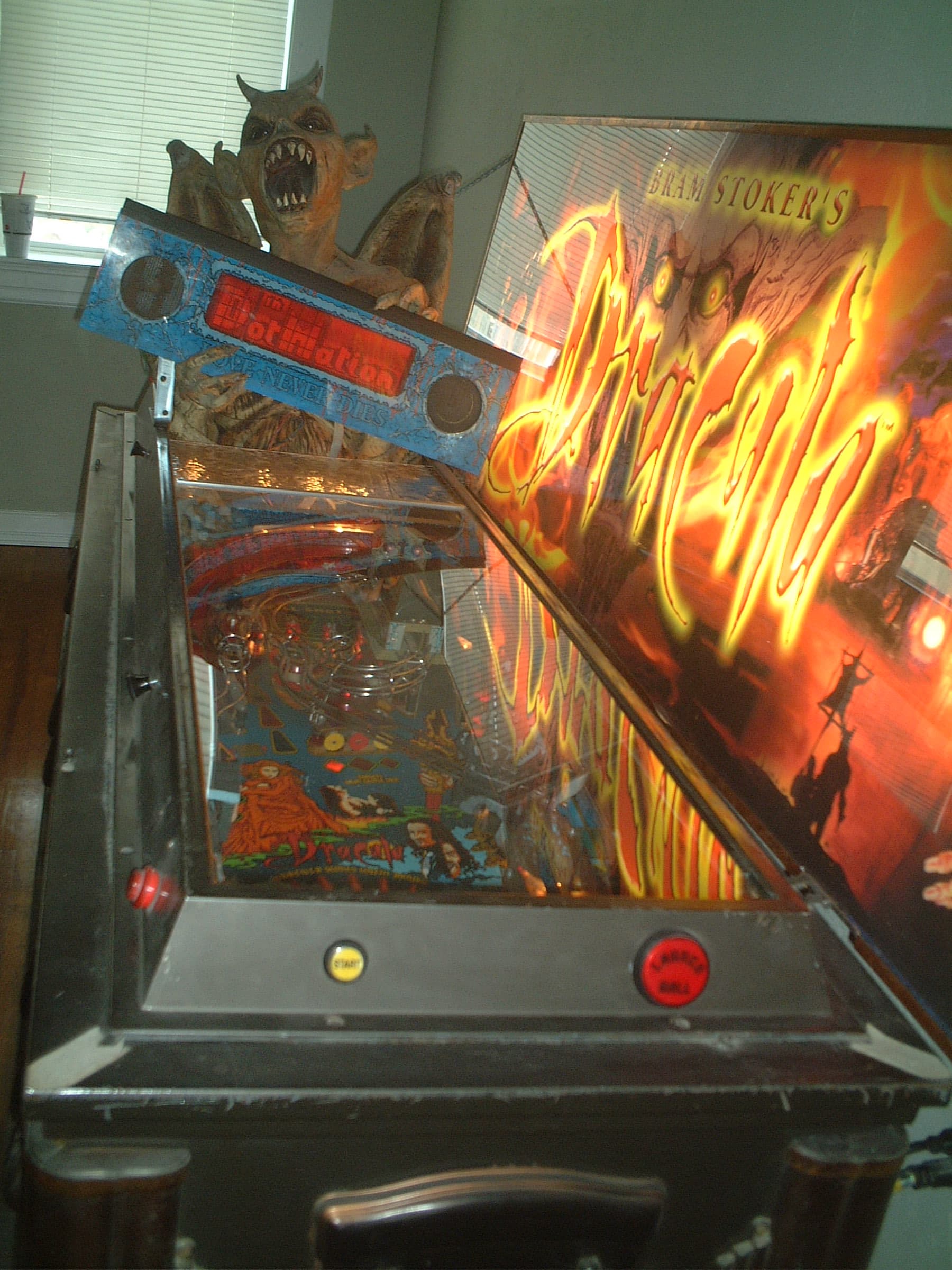 Bram Stoker's Dracula pinball machine with monster and fiery backdrop