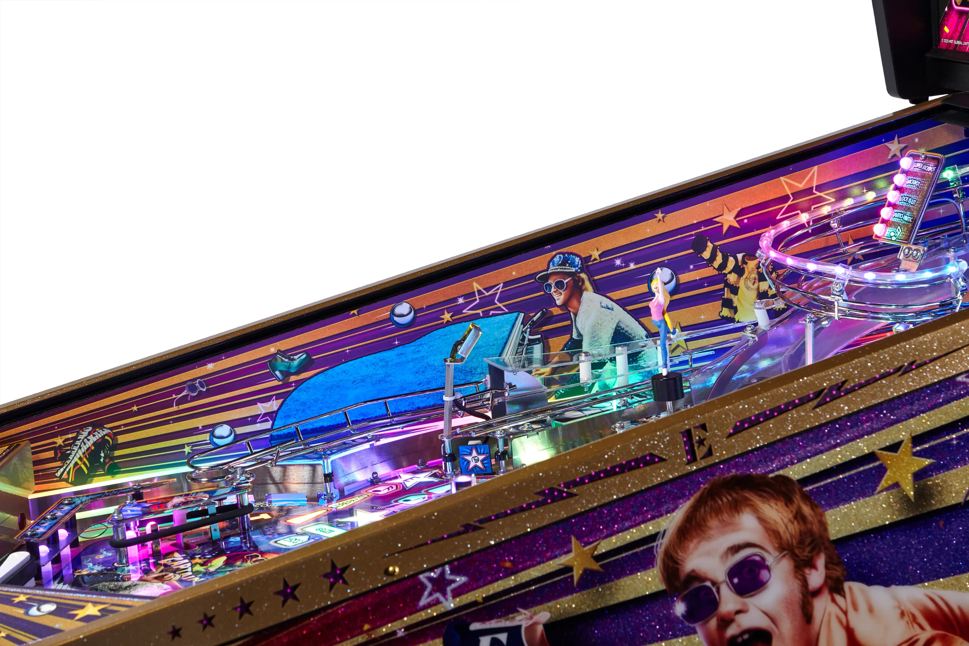 Colorful pinball machine with glowing lights and retro music theme