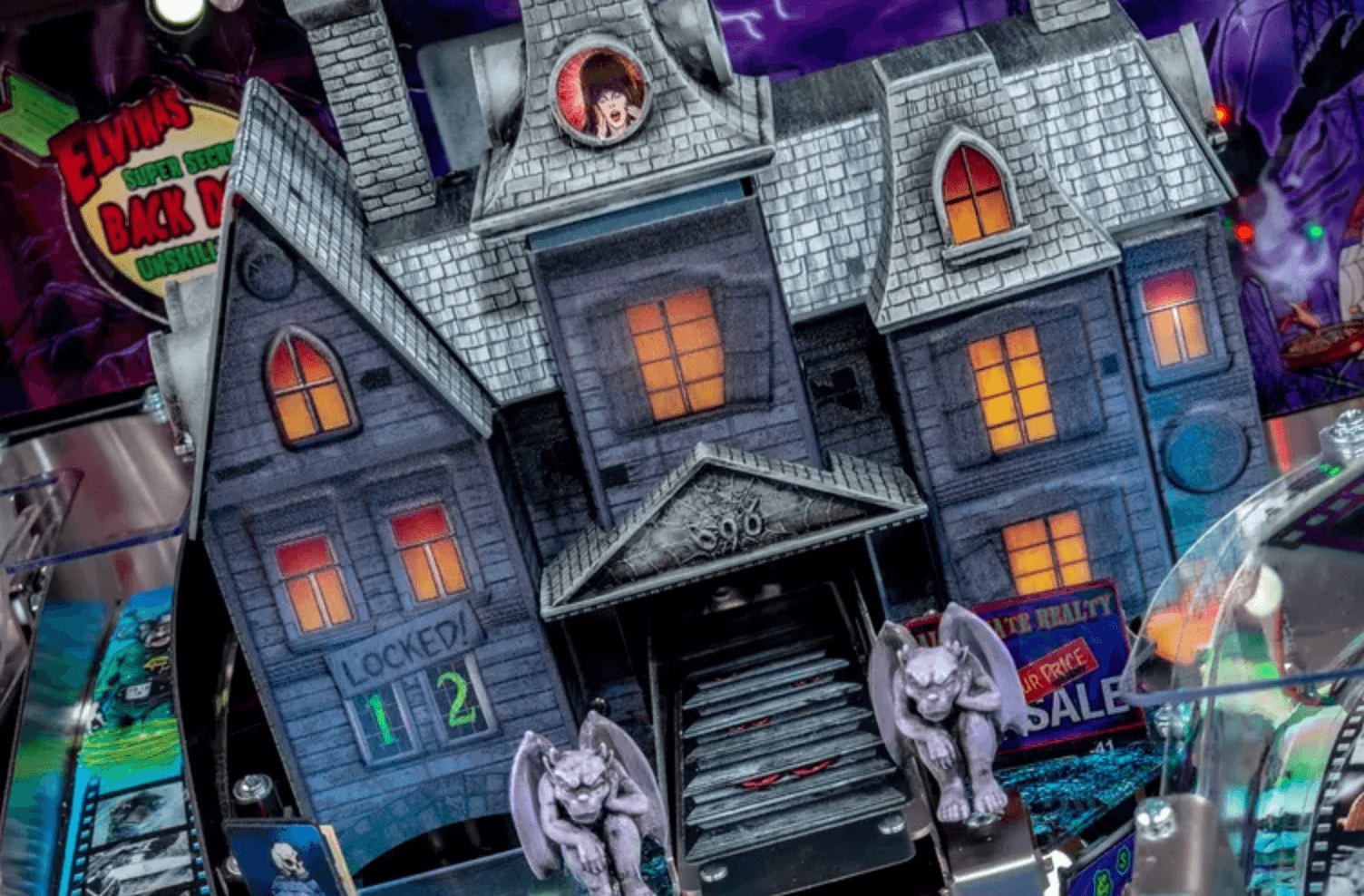 Spooky haunted house board game with gargoyles and glowing windows