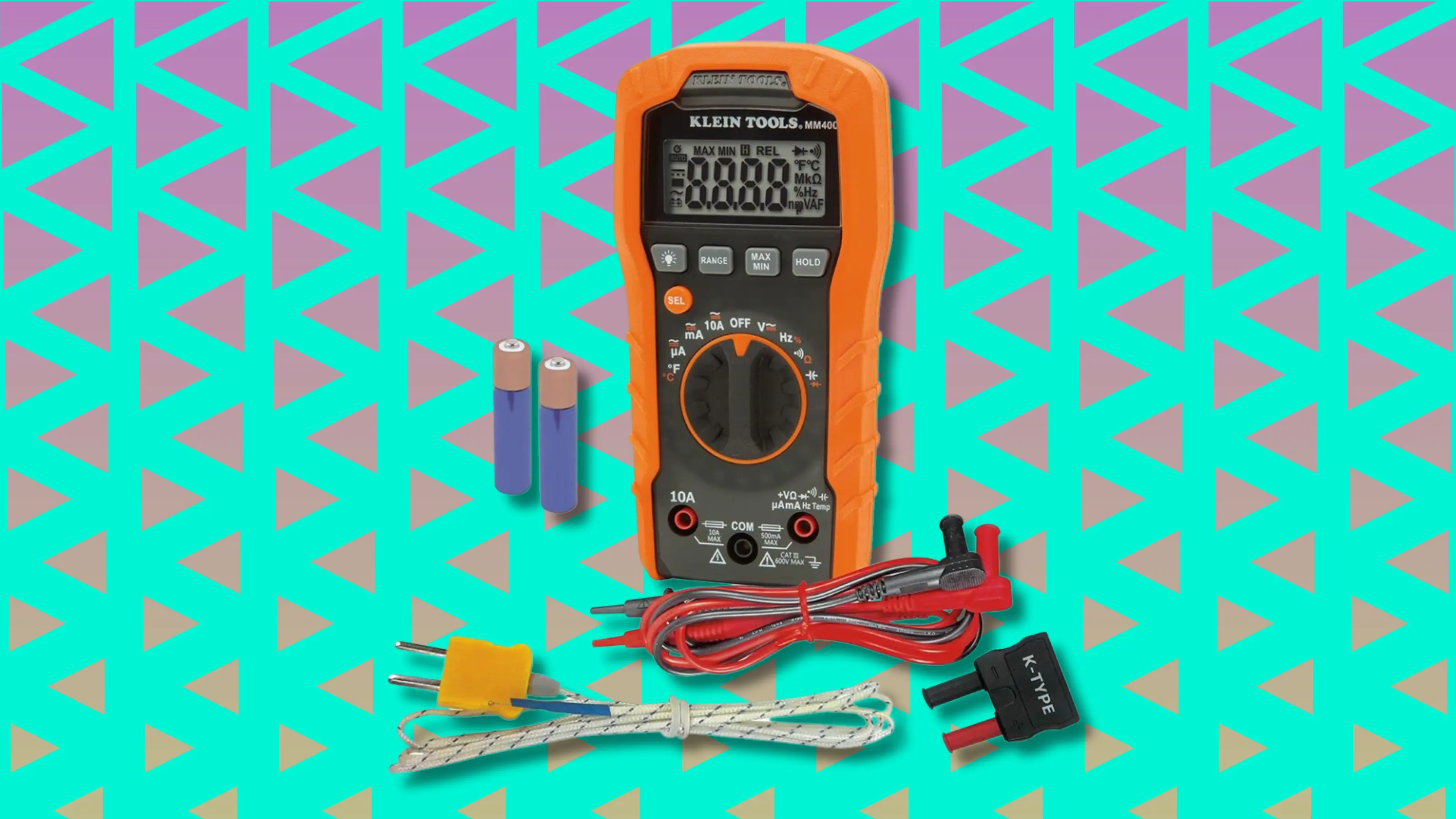 Orange Klein Tools digital multimeter with test leads and batteries