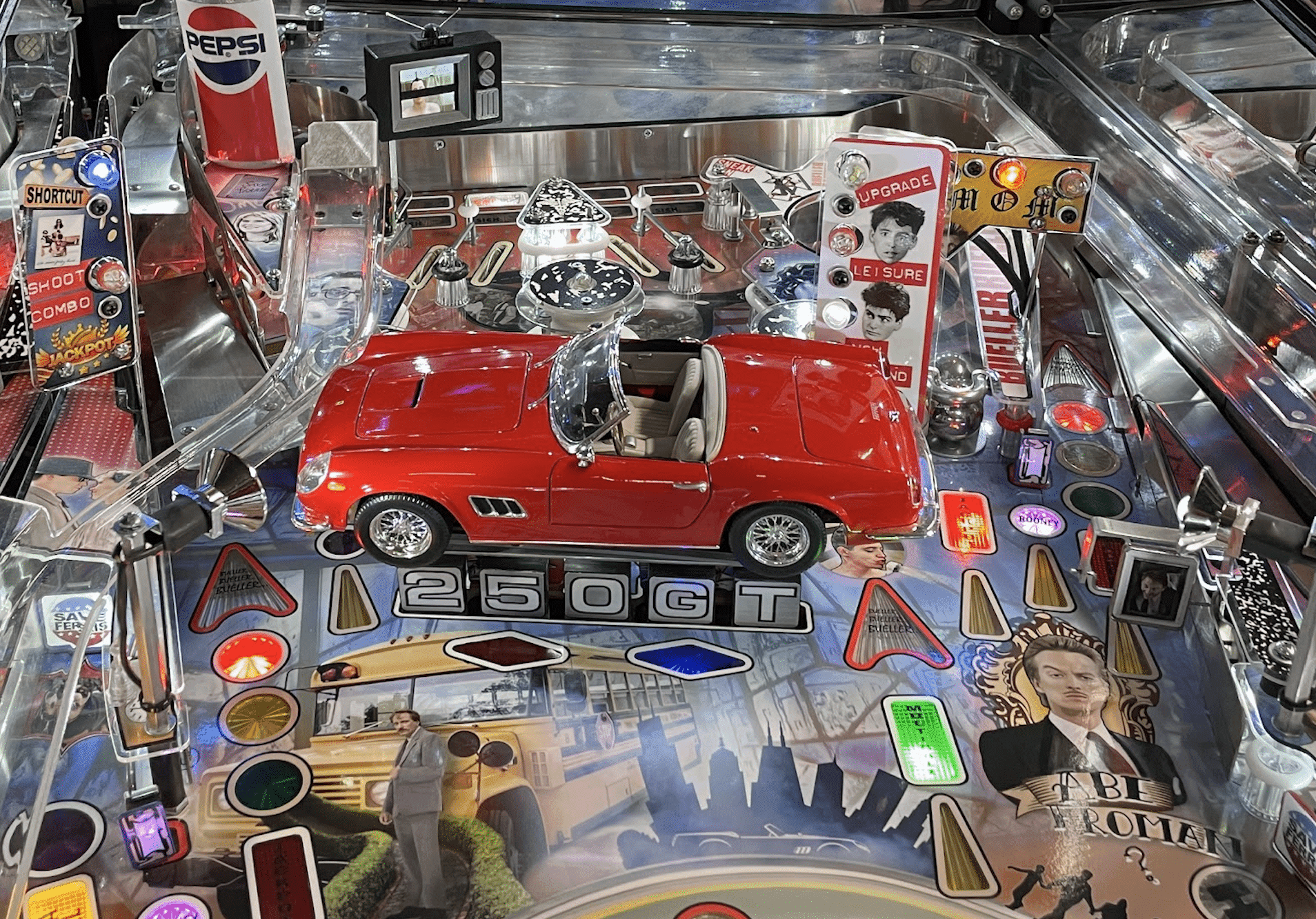 Vintage red Ferrari 250 GT on detailed pinball machine playfield