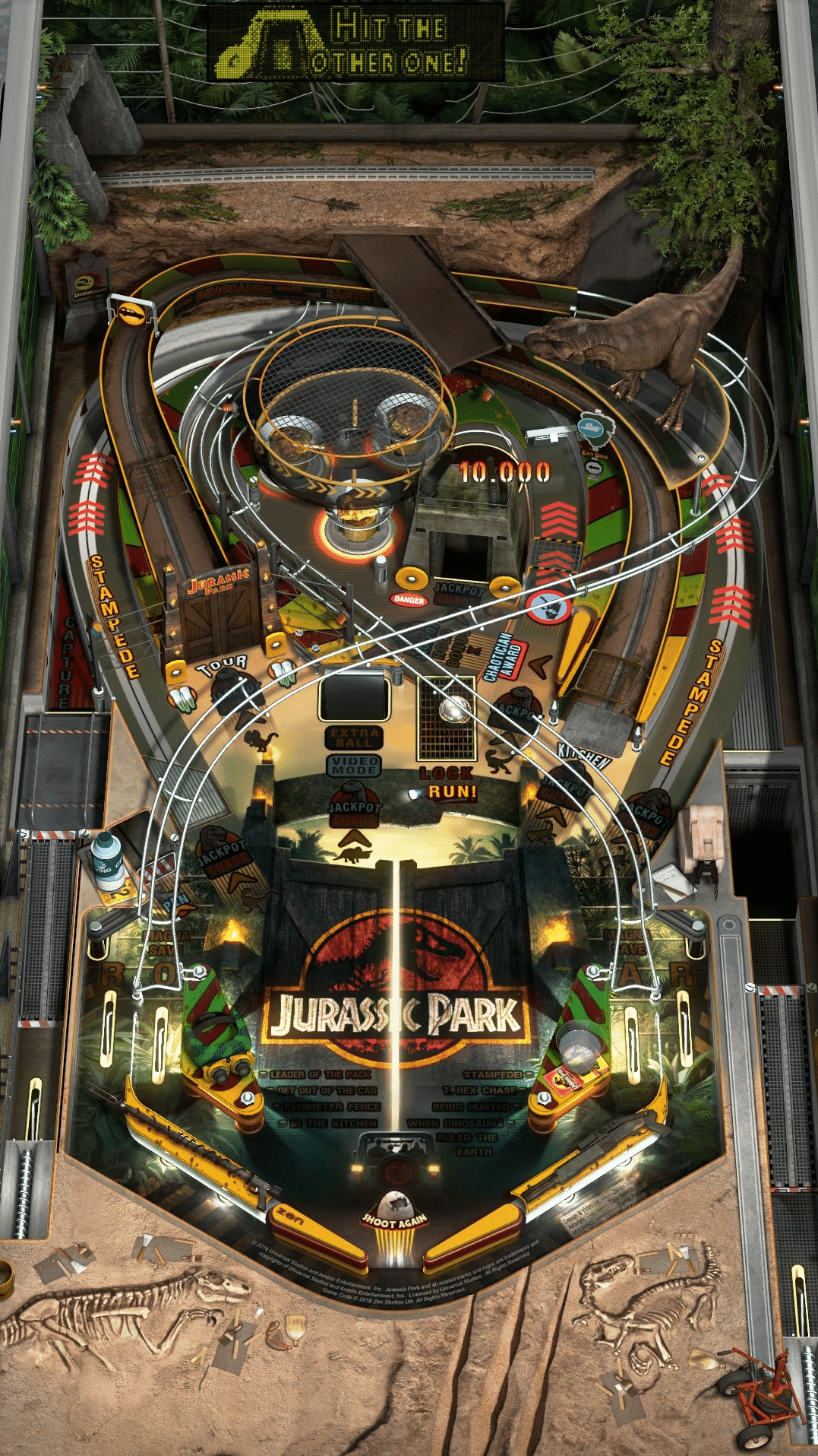 Jurassic Park themed pinball machine with dinosaur tracks and logo