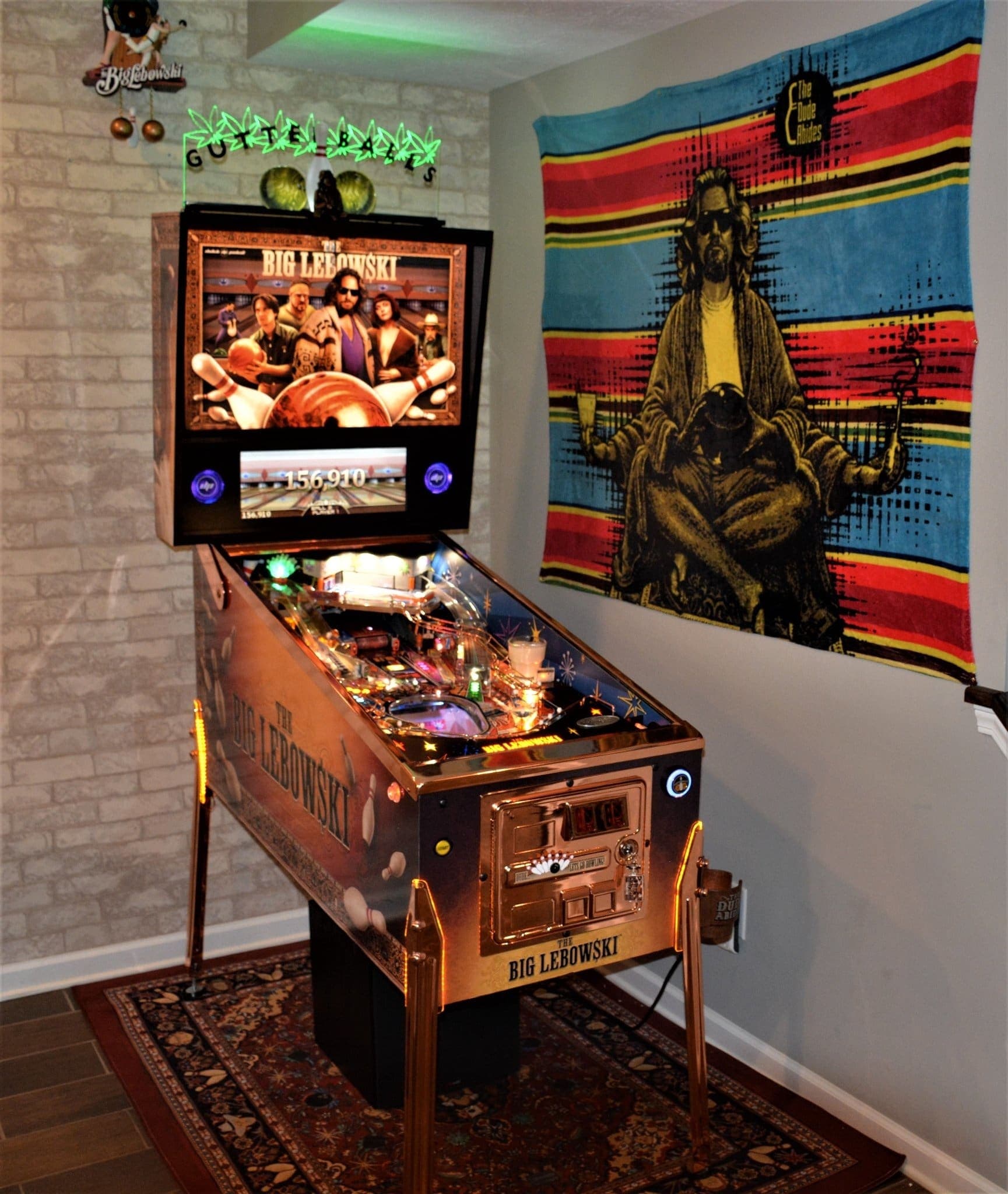 The Big Lebowski pinball machine with colorful game board and movie poster