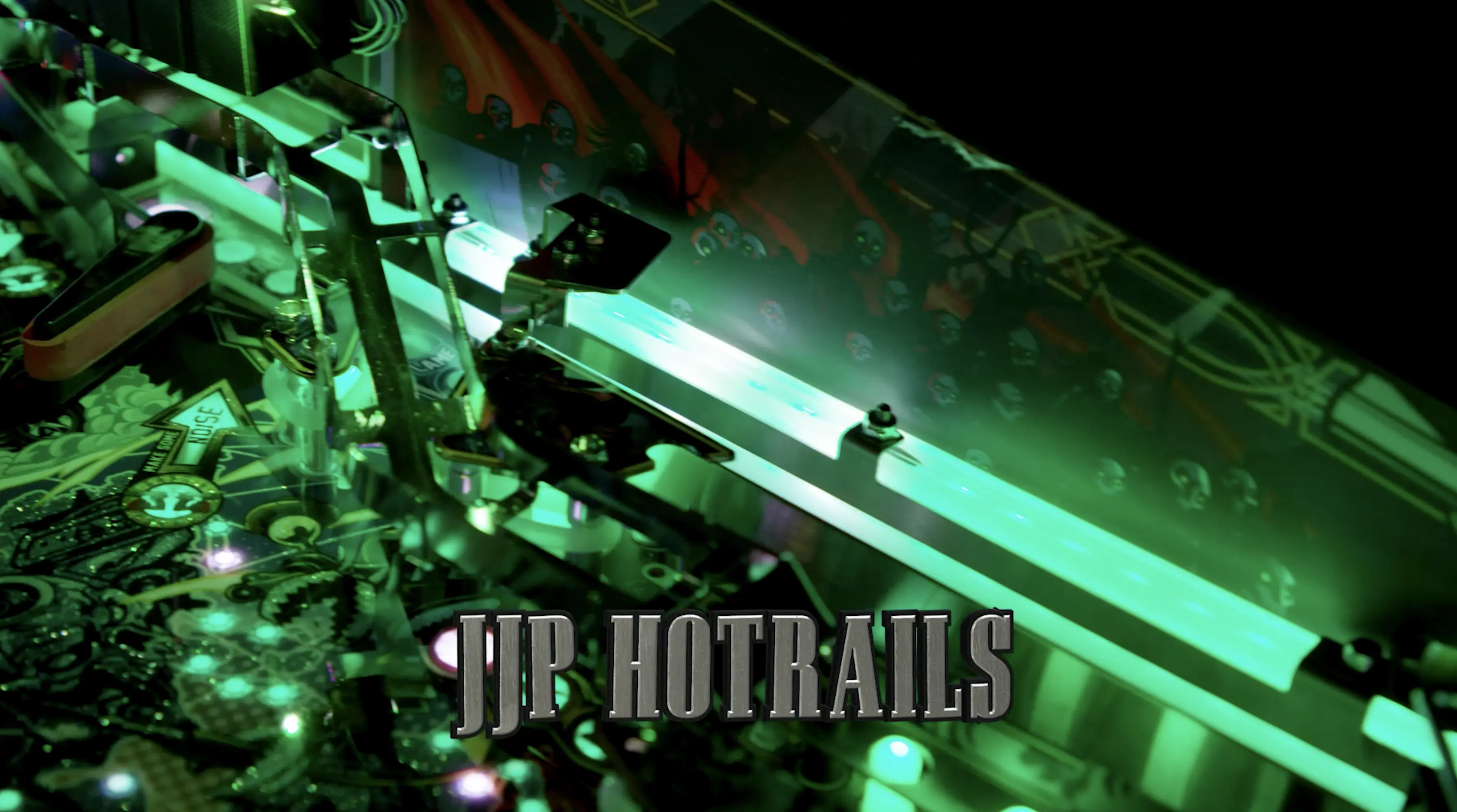 Green-tinted JP Hotrails logo on complex mechanical background