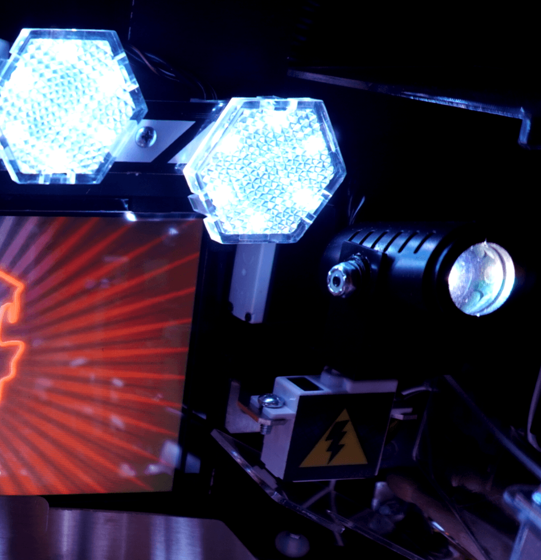 Hexagonal LED lights and technical equipment with high-voltage warning sign