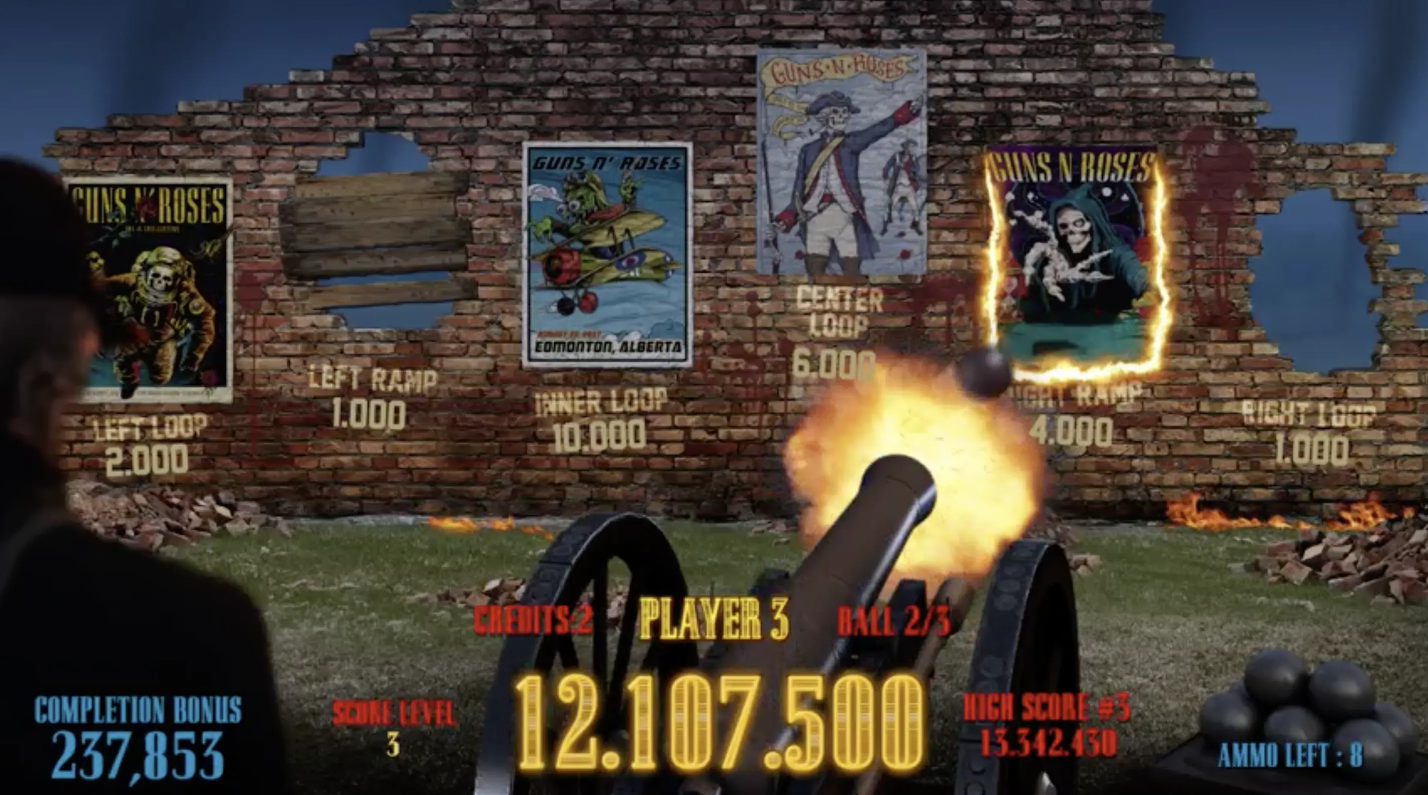 Guns N' Roses pinball machine screen with cannon and score display