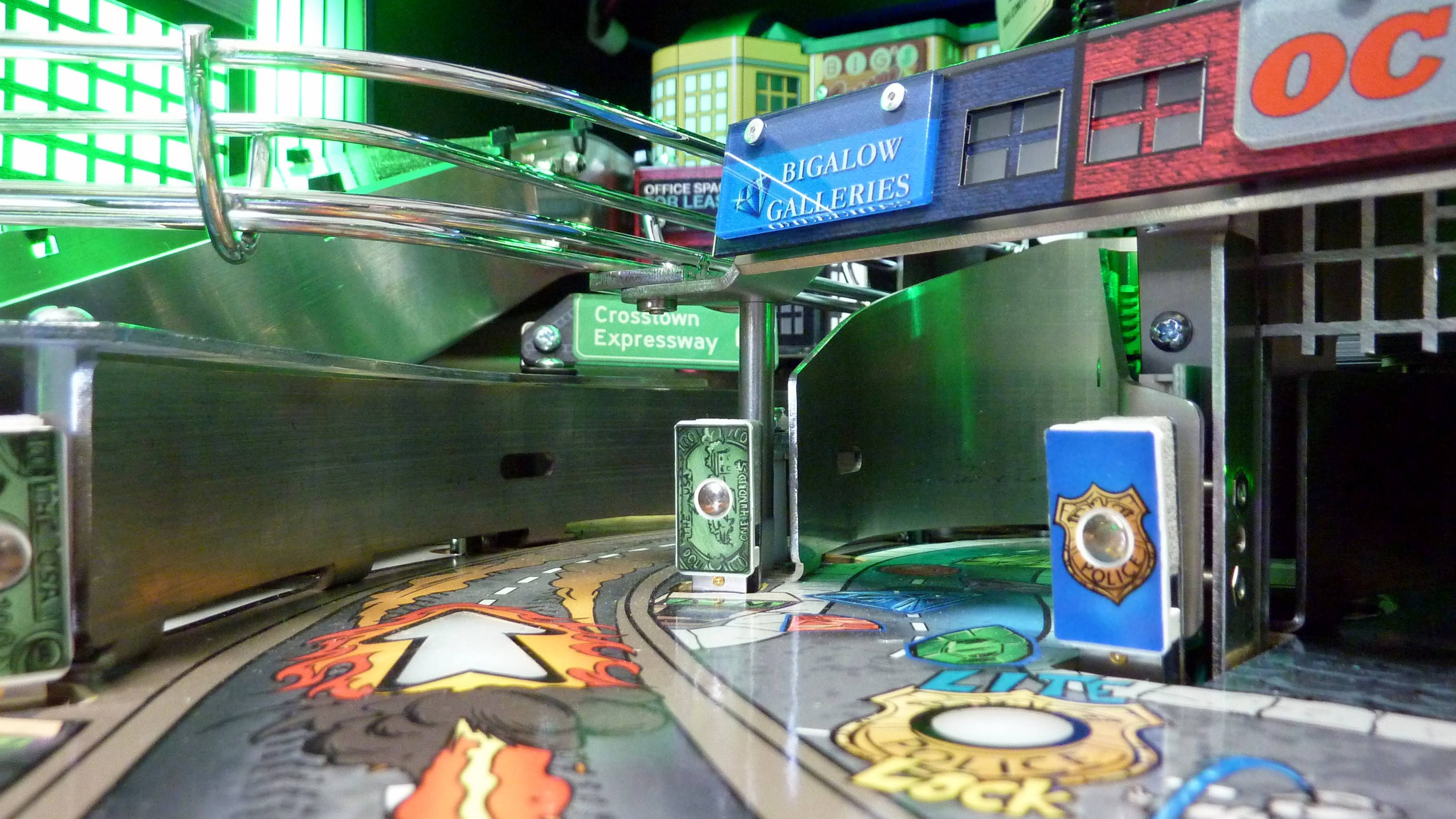 Pinball machine detail with Crosstown Expressway and Bigalow Galleries signs