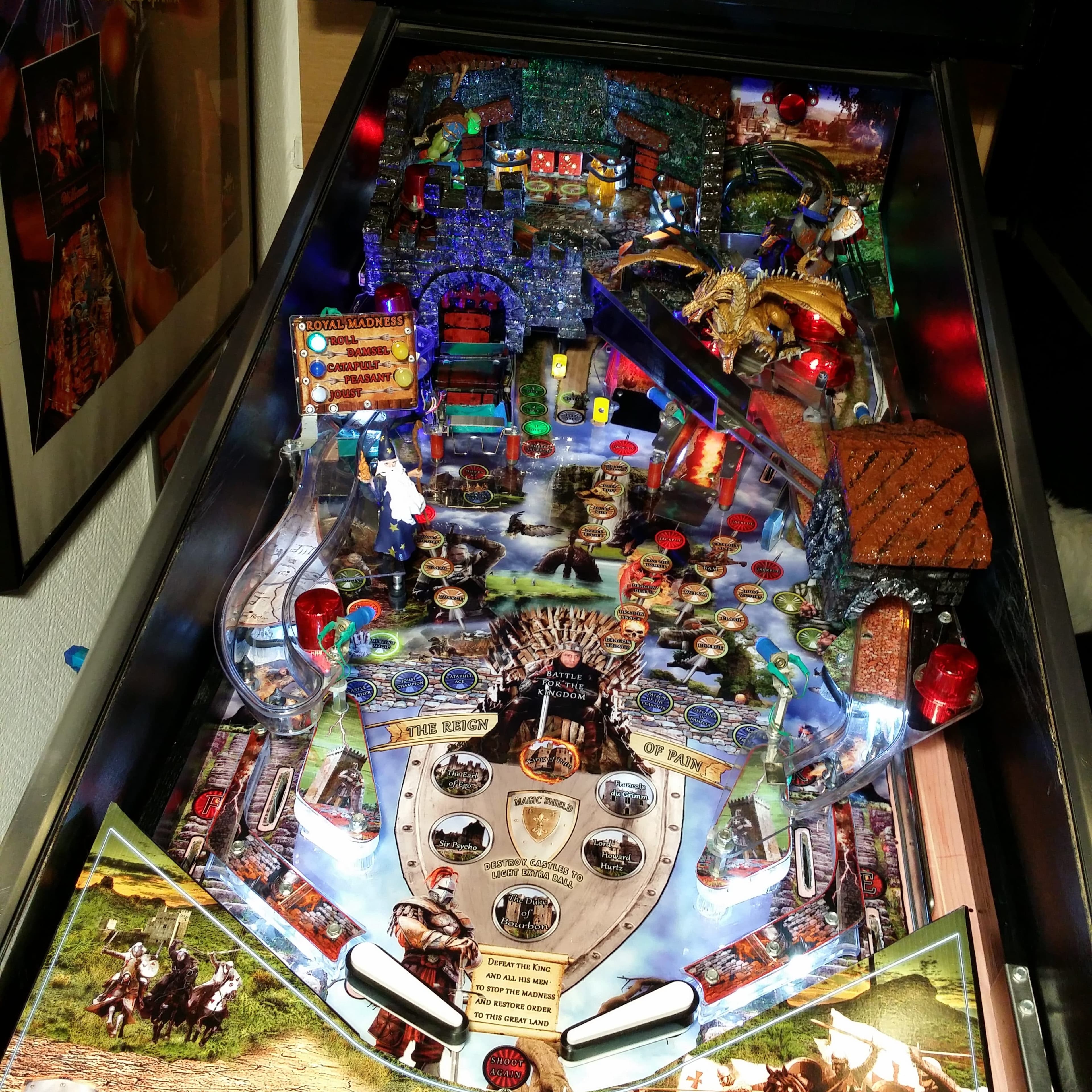 Game of Thrones themed pinball machine with colorful detailed playfield