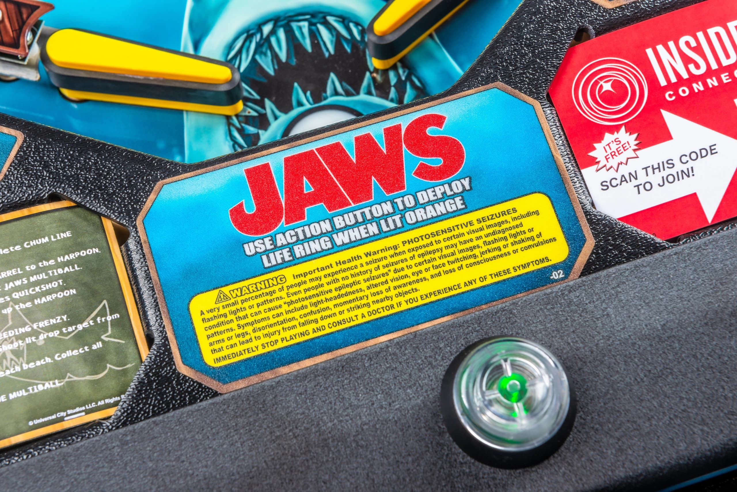 Jaws board game closeup with warning label and shark graphic