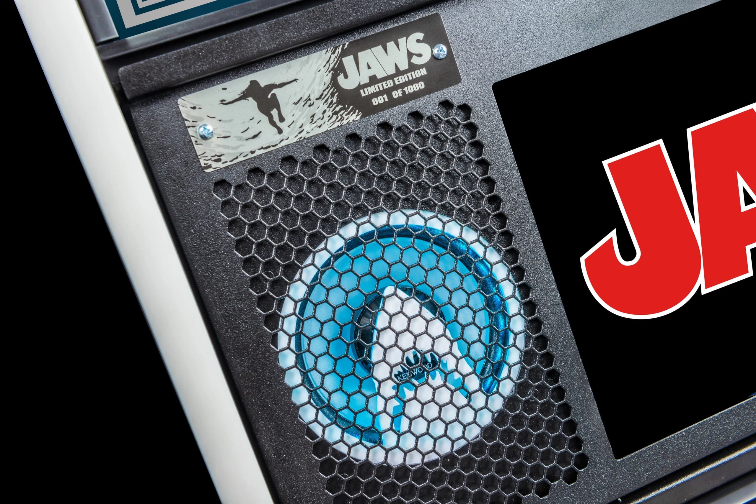 Jaws limited edition collectible with surfing silhouette and blue logo