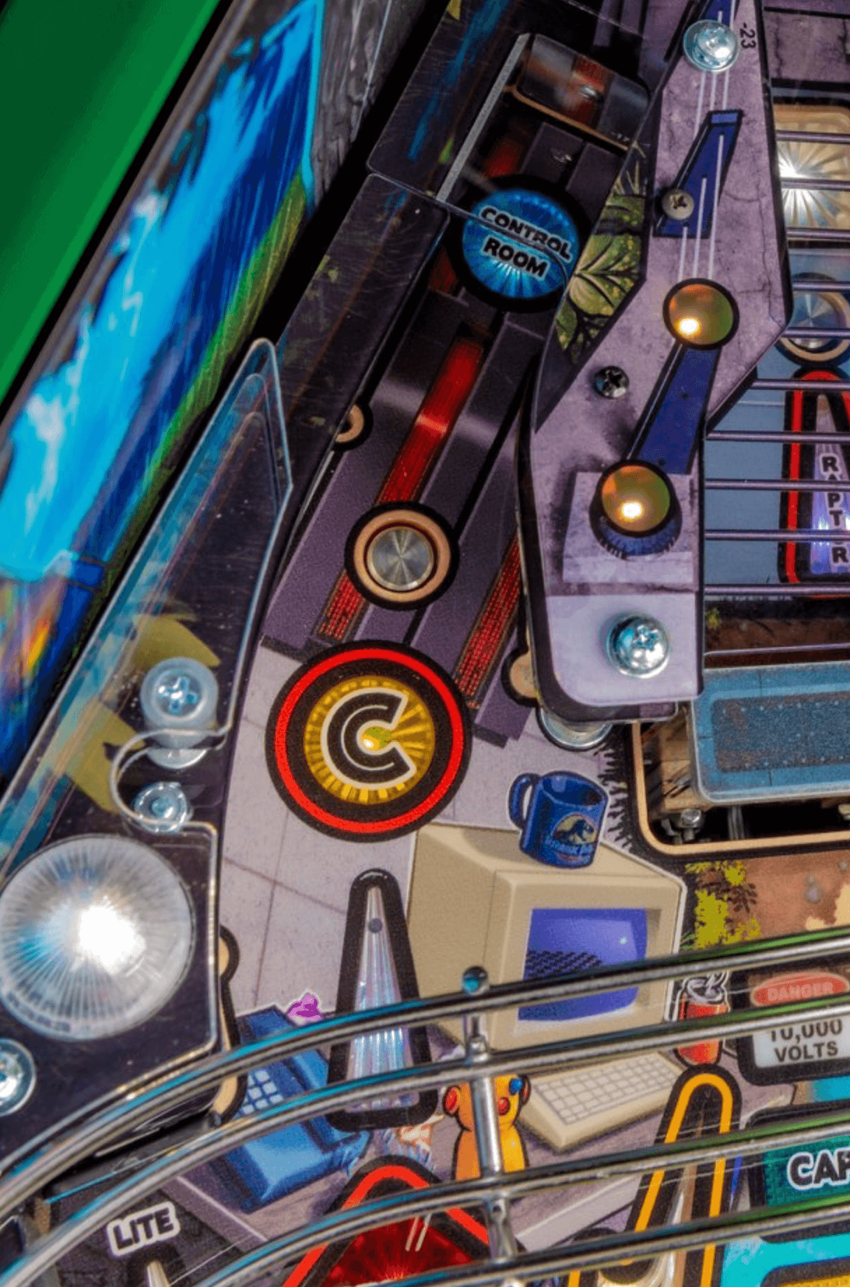 Detailed close-up of a colorful pinball machine control panel with buttons