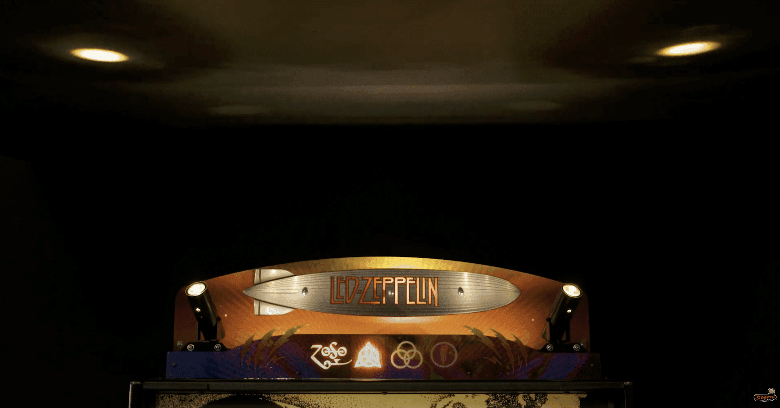 Led Zeppelin logo with zeppelin airship and band symbols