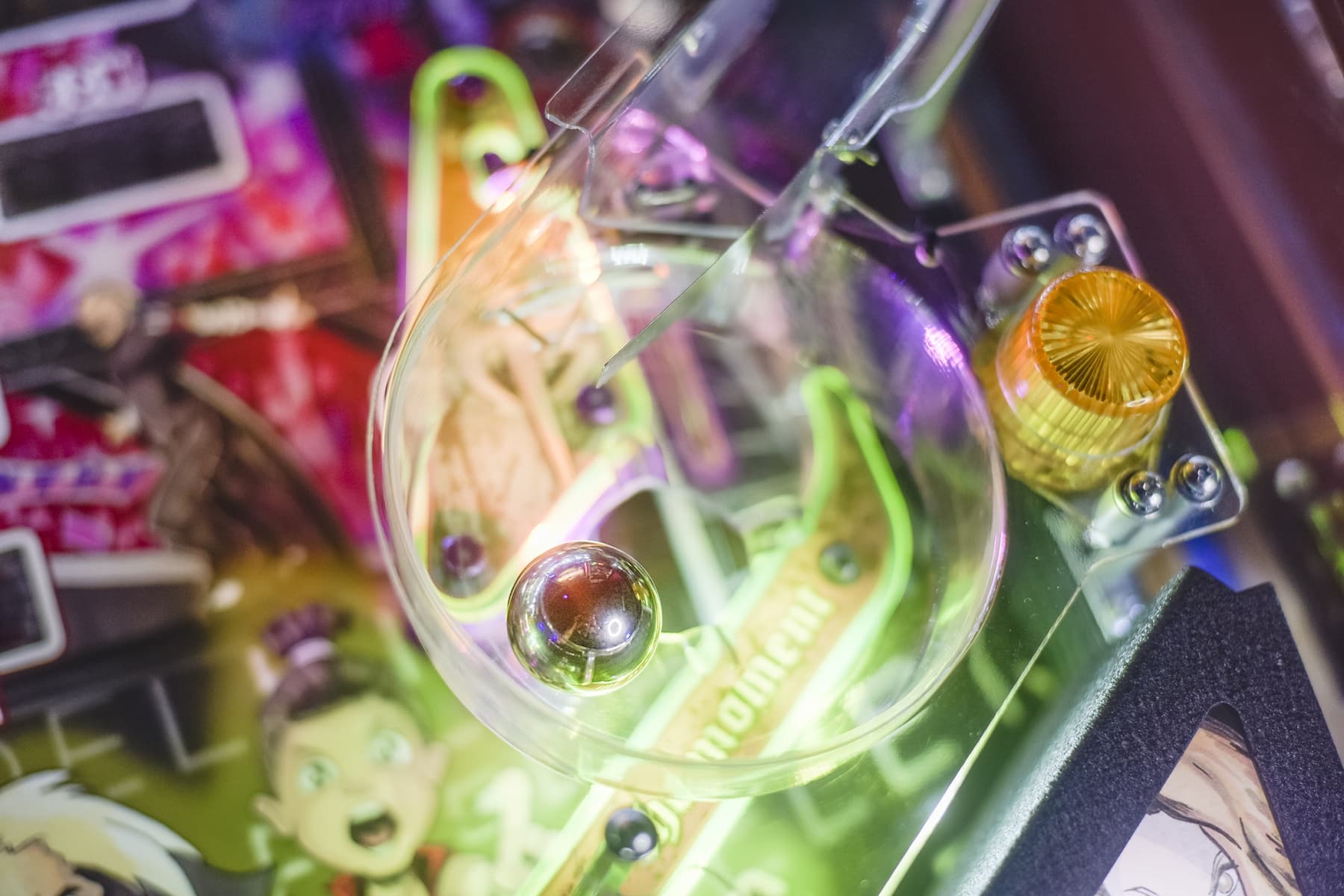 Scientific glassware with colorful reflections and bubbles in laboratory setting