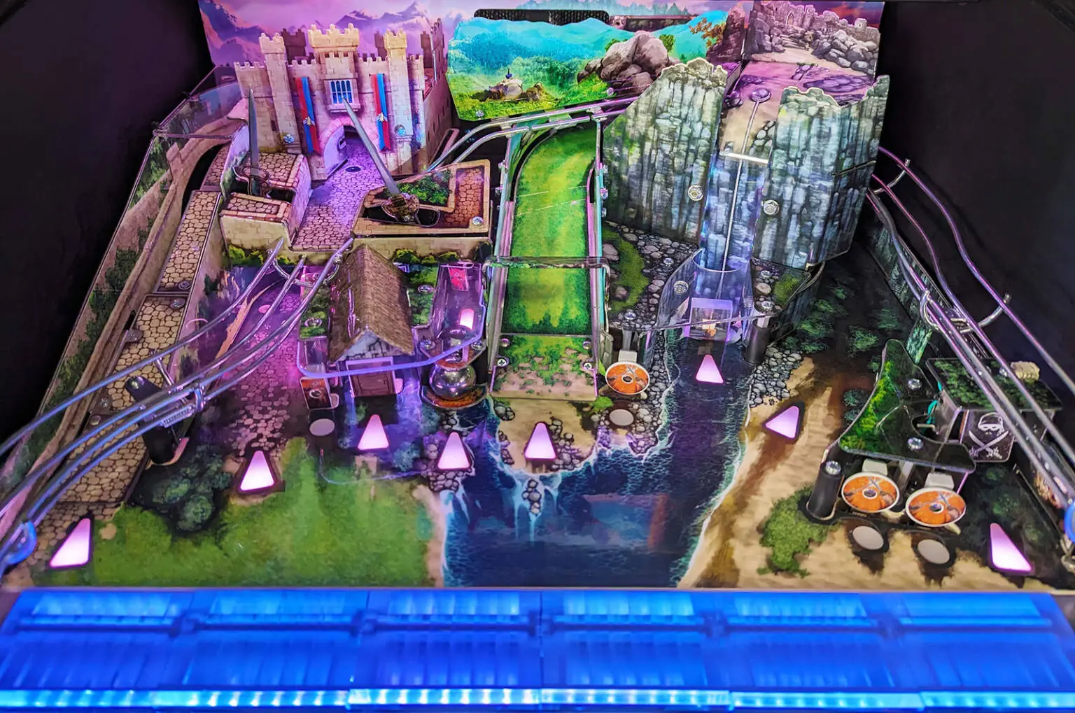 Colorful fantasy board game with castle, paths, glowing purple triangles