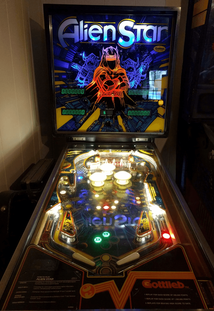 Vintage Alien Star pinball machine with colorful sci-fi themed playfield