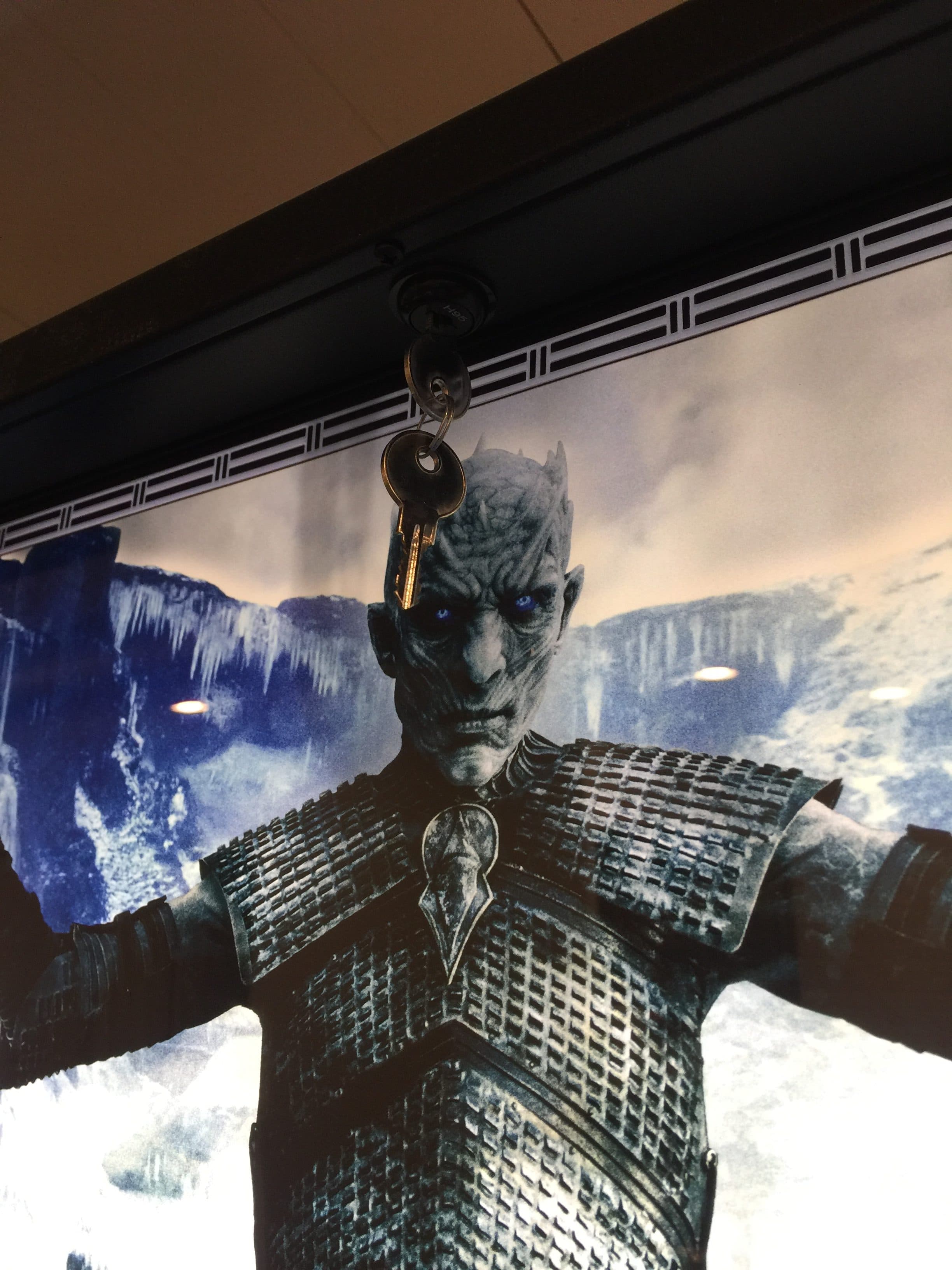 Night King figurine with icy blue eyes against wintry Game of Thrones backdrop