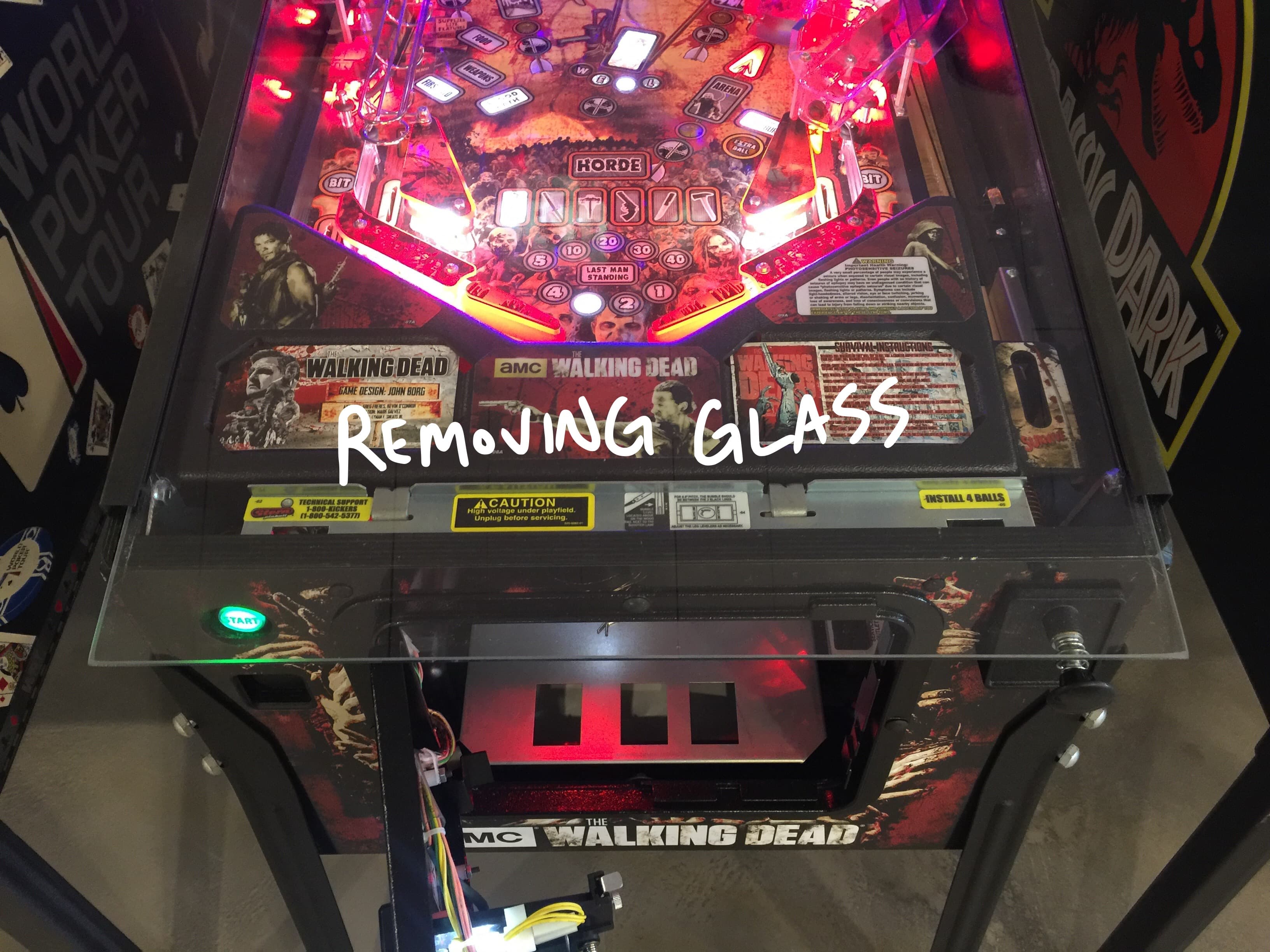 The Walking Dead pinball machine with colorful lights and playfield