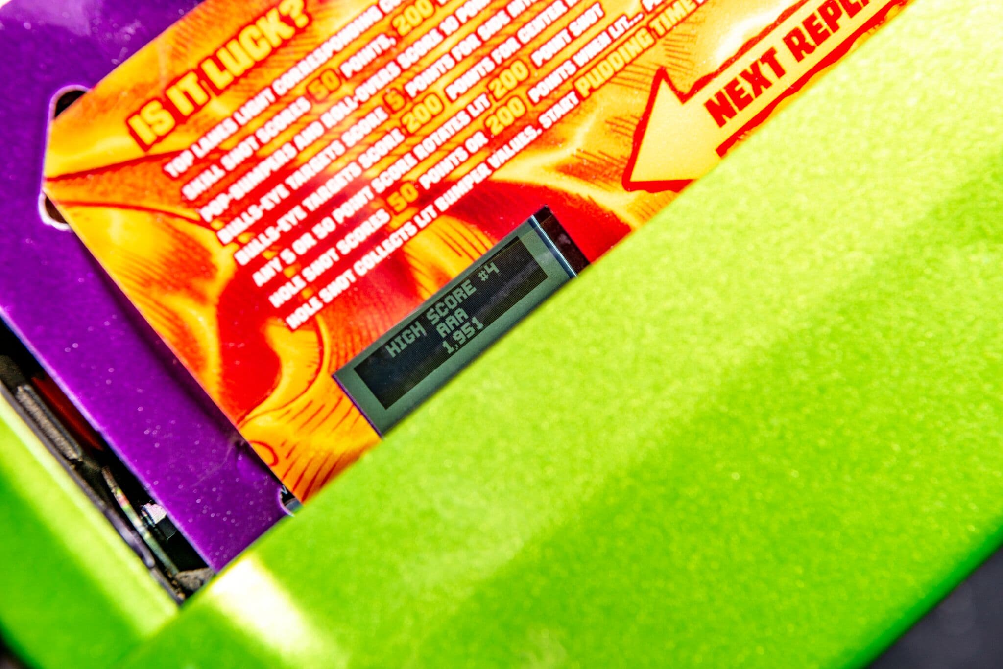 Colorful game screen with high score display and vibrant background