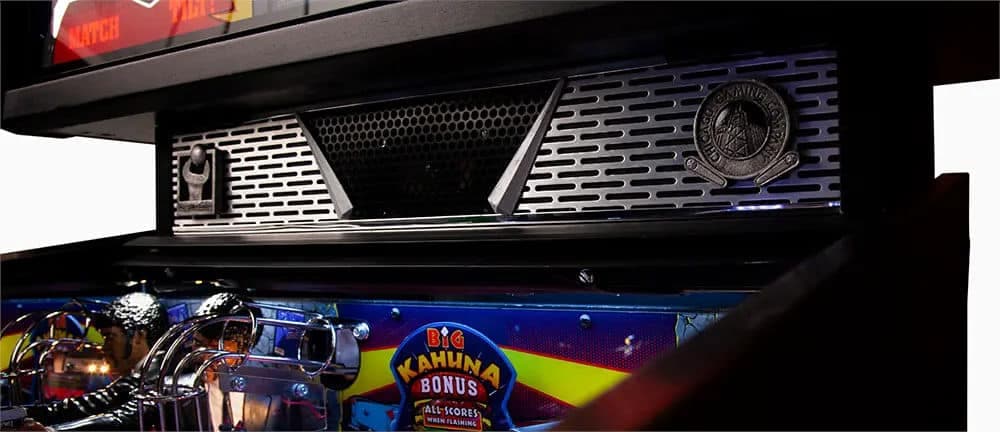 Pinball machine detail with Big Kahuna Bonus sign and metallic panels