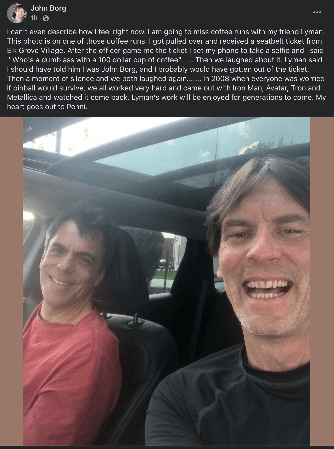Two friends smiling inside a car during a coffee run