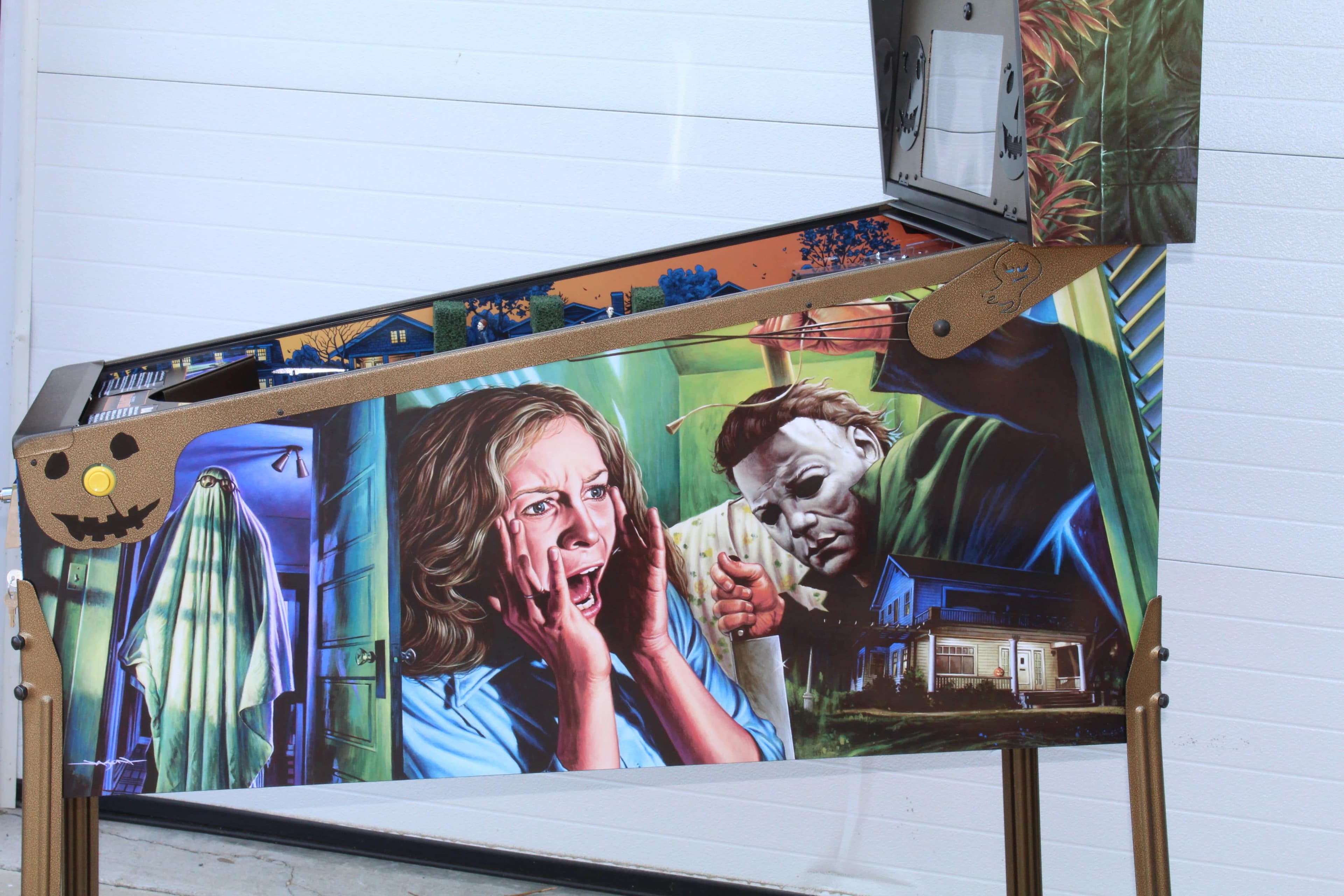 Halloween movie scene with scared woman and masked killer in blue room