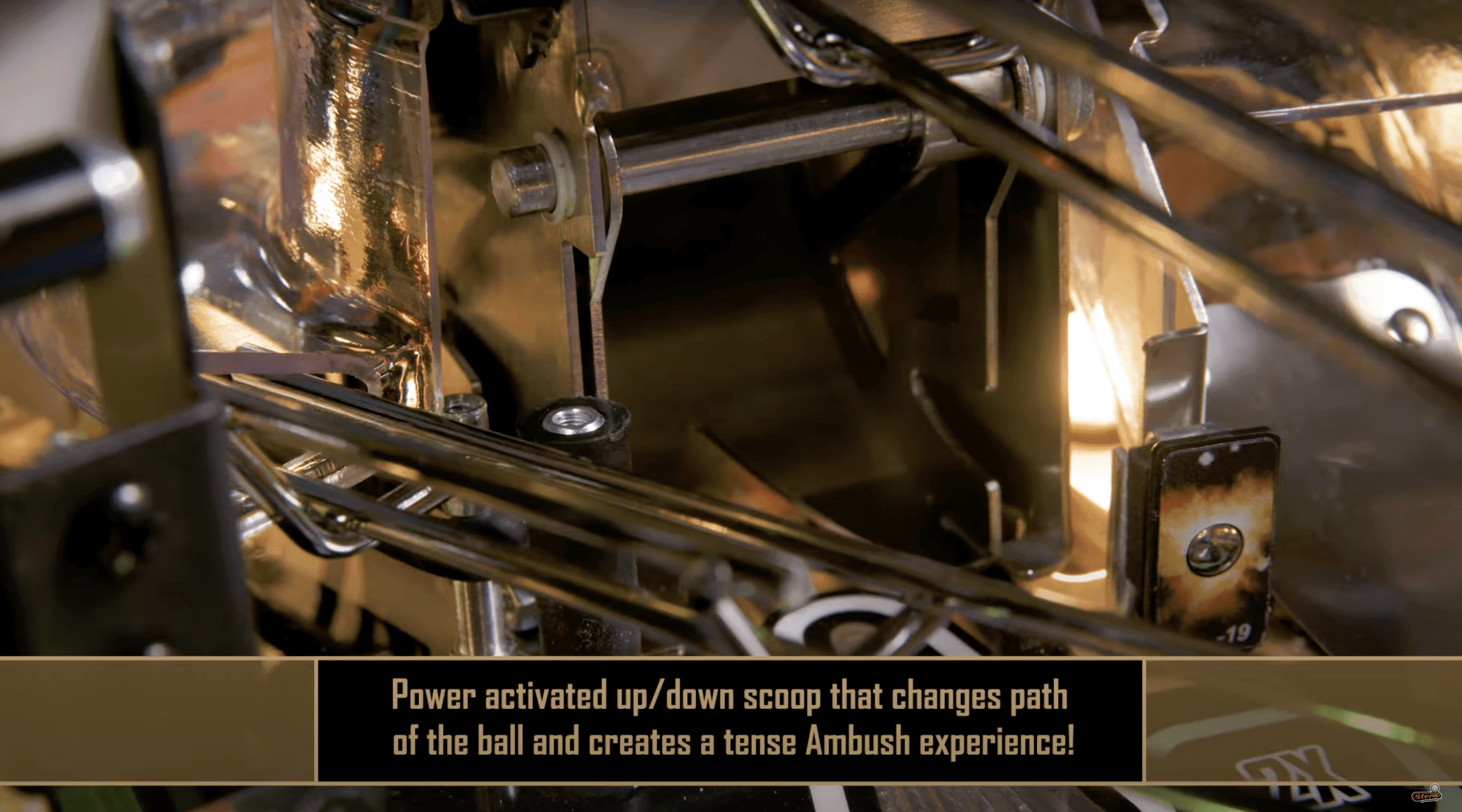 Close-up of pinball machine mechanism with metallic components