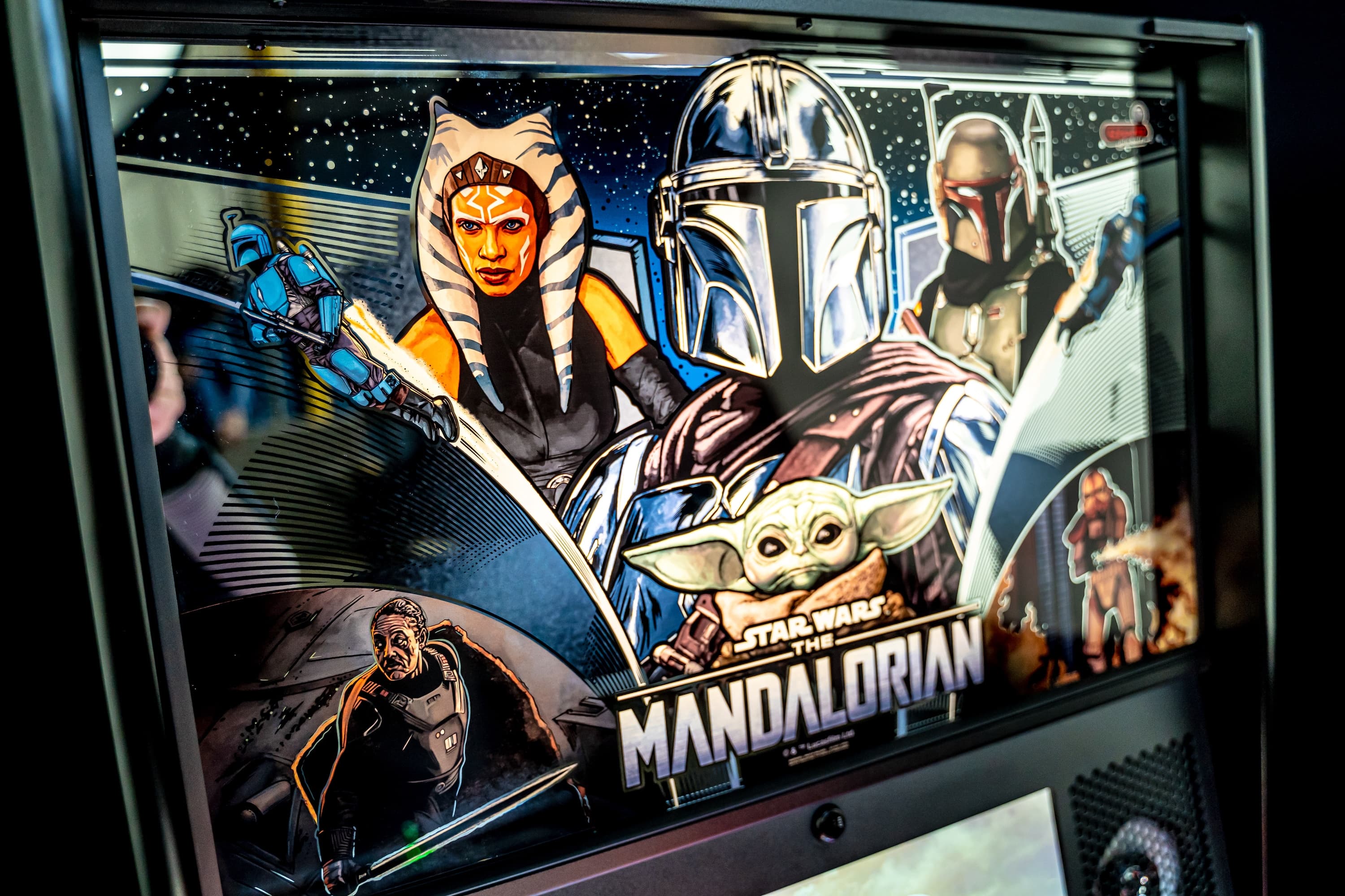 Star Wars The Mandalorian characters in action on starry background