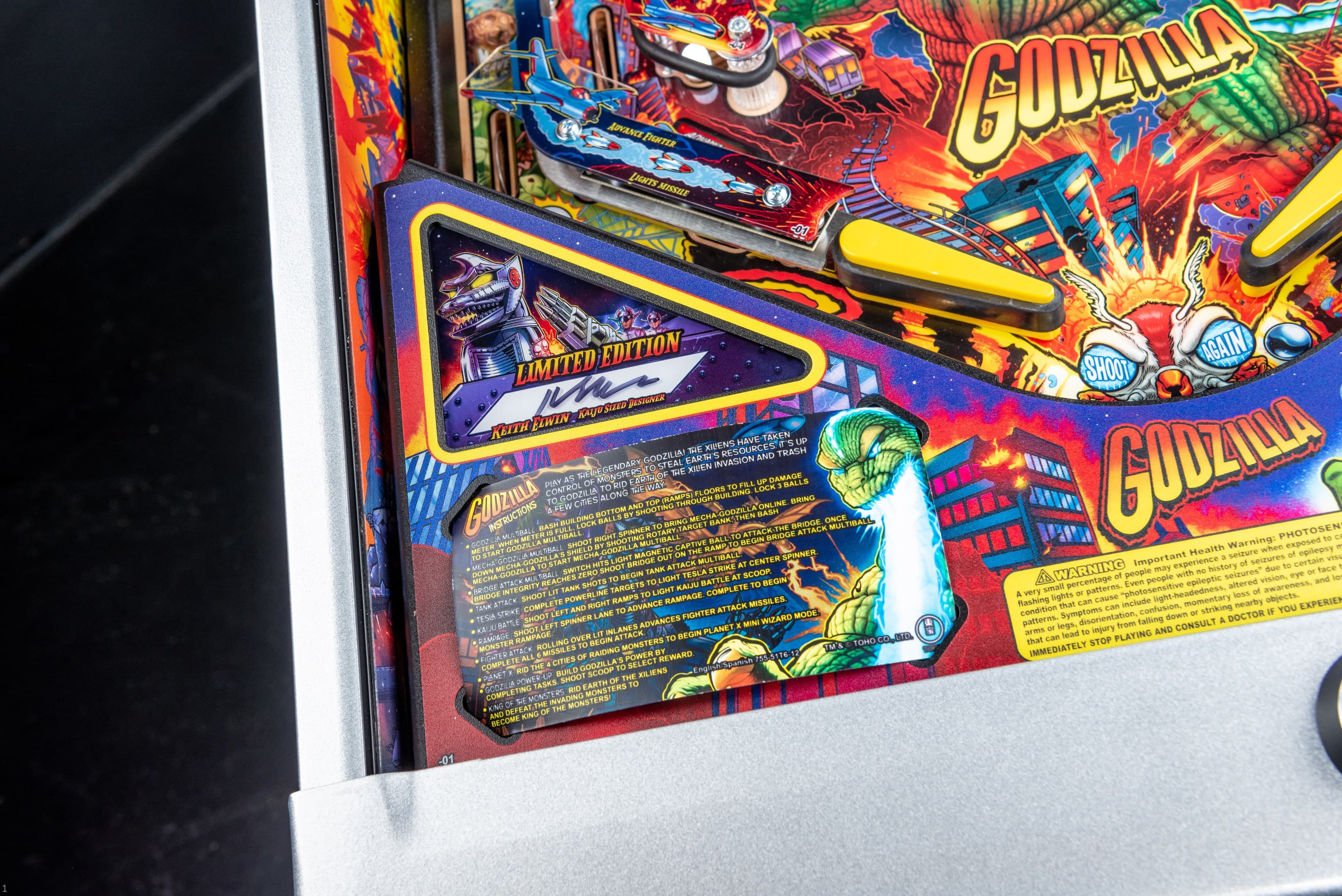 Godzilla pinball machine with colorful artwork and limited edition panel