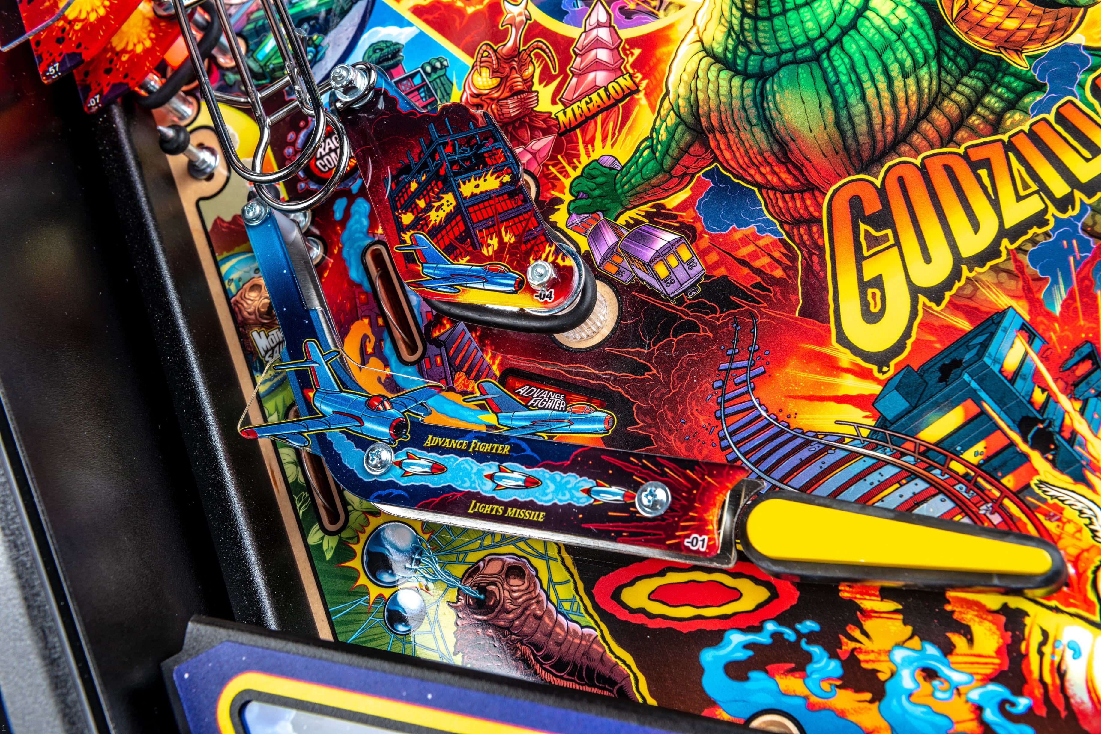Colorful Godzilla pinball machine with vibrant sci-fi action scenes