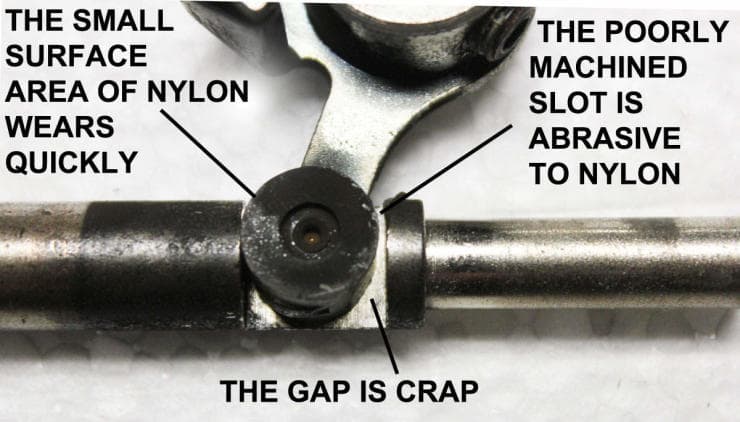 Close-up of mechanical part with annotated criticisms of nylon surface and design